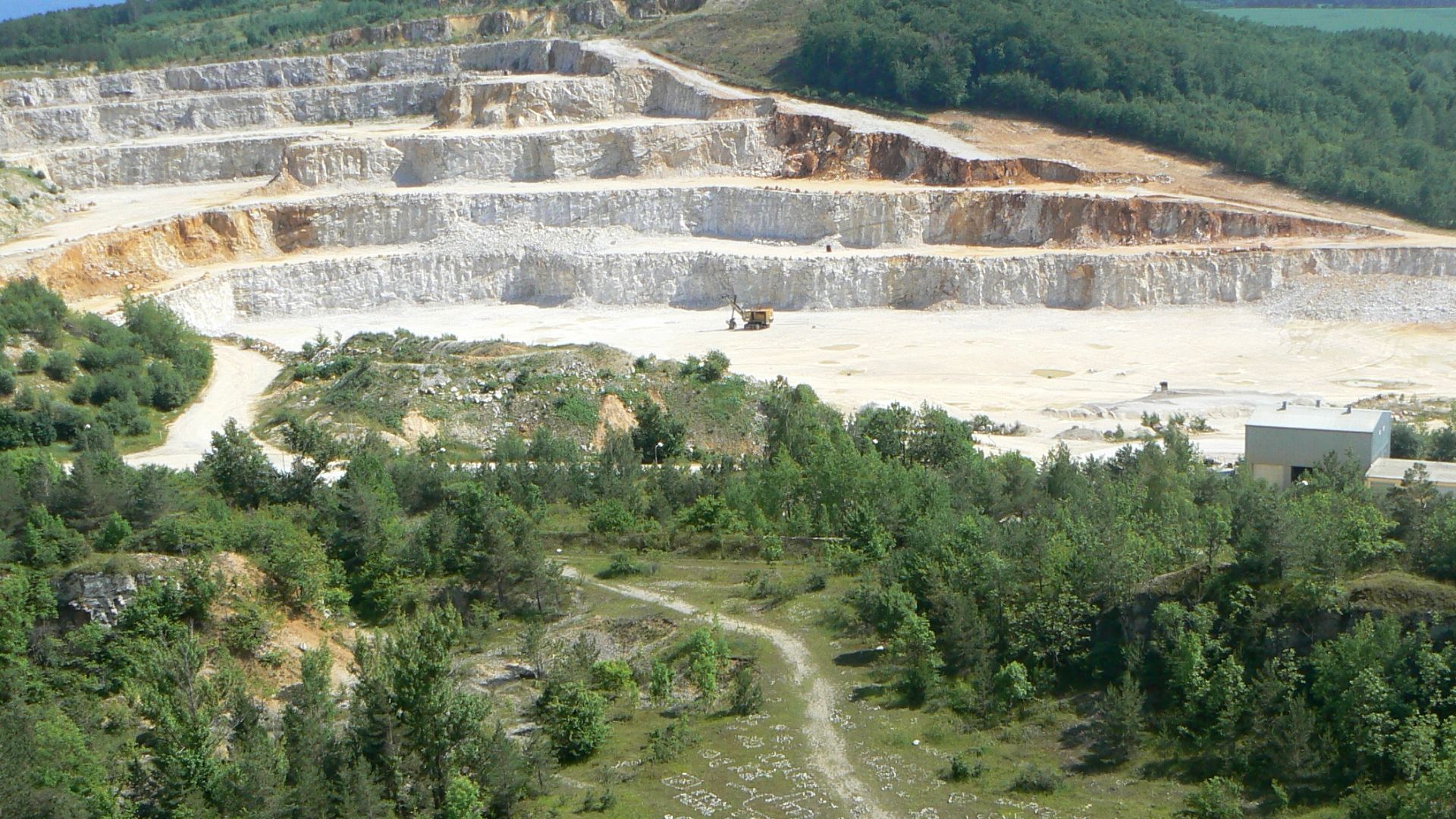 Open quarry near national nature monument Zlatý kůň in Beroun District