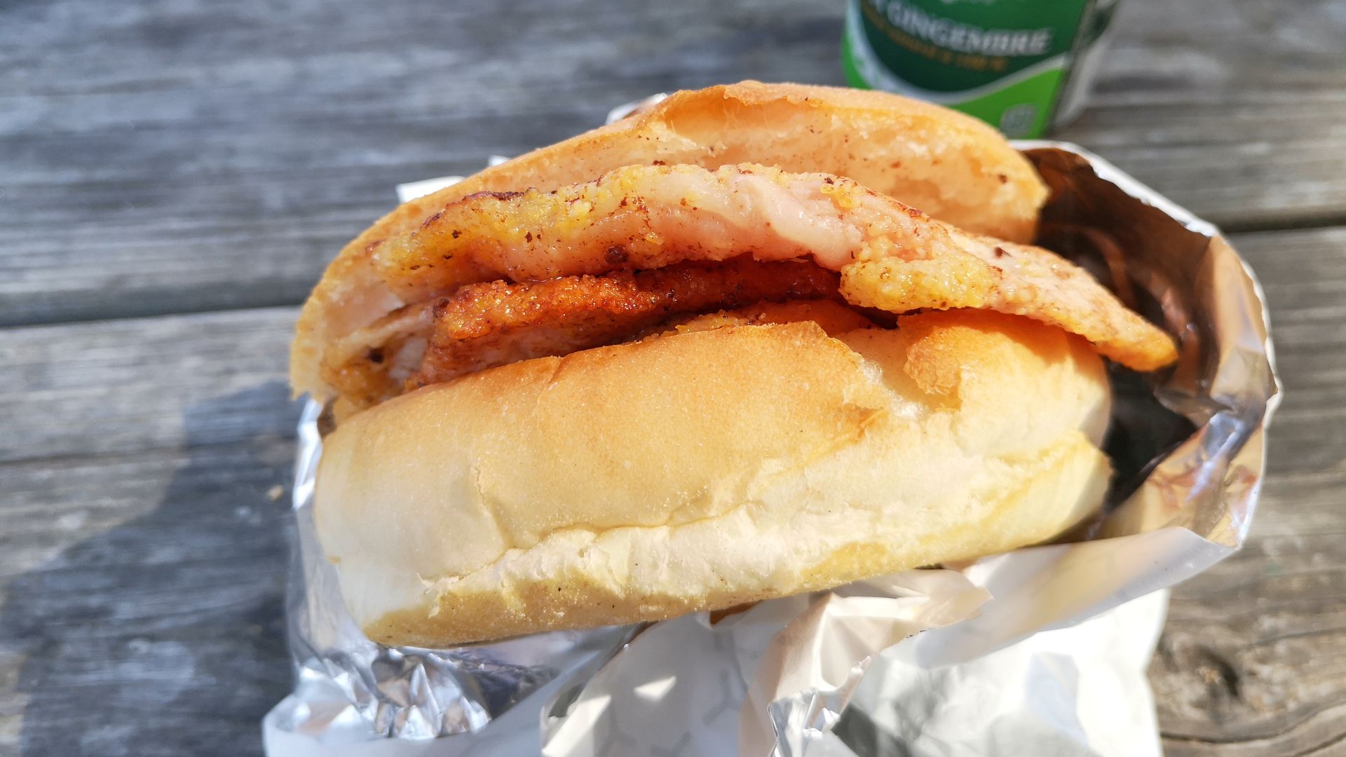 Side view of a peameal bacon sandwich from Carousel Bakery in Toronto