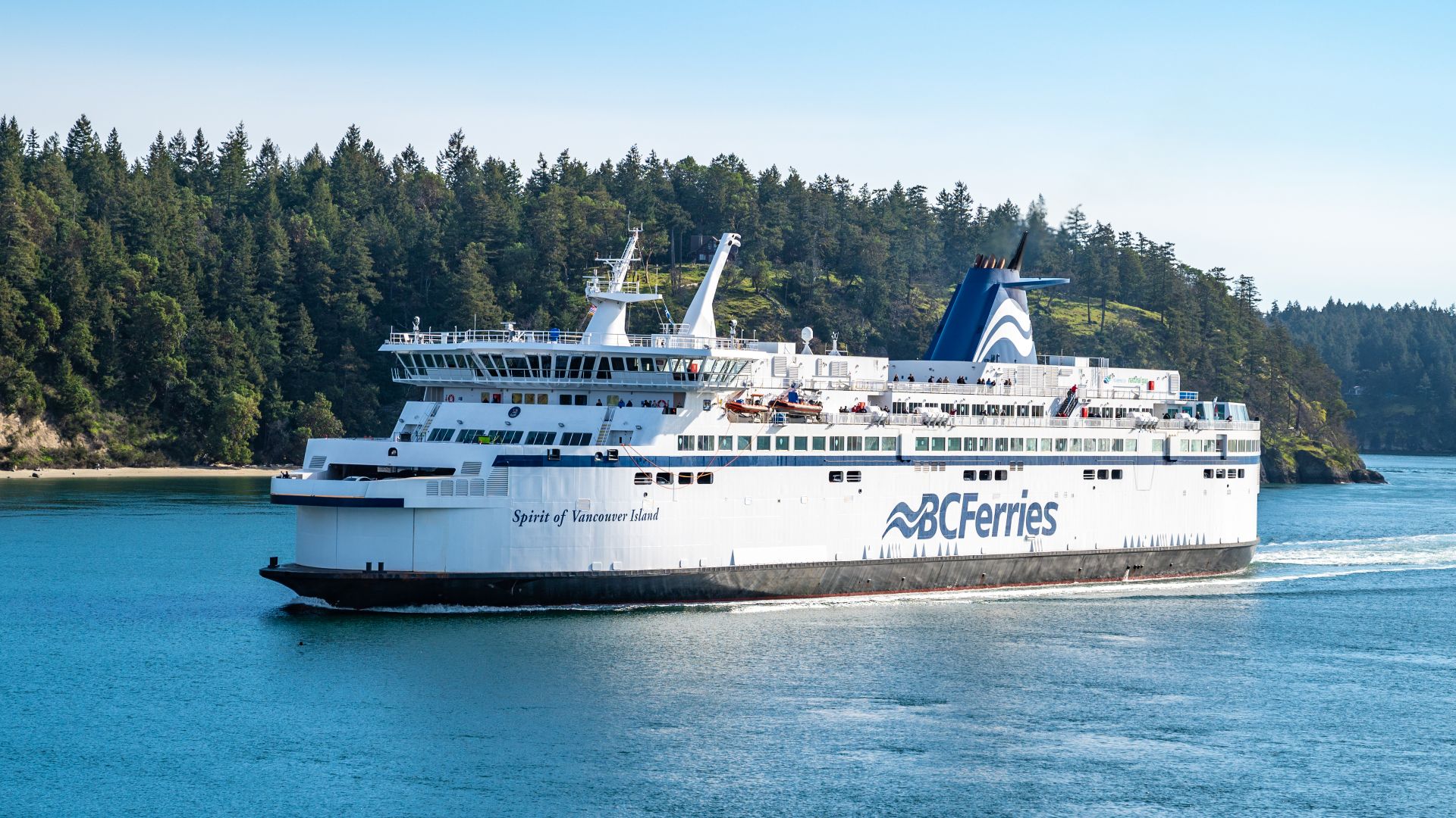 BC Ferries RORO ferry, MV SPIRIT OF VANCOUVER ISLAND – IMO 9030682, in Active Pass between Galiano Island (Bluffs Park) and Mayne Island, en route from Tsawwassen to Swartz Bay, BC Canada  on April 6, 2022.