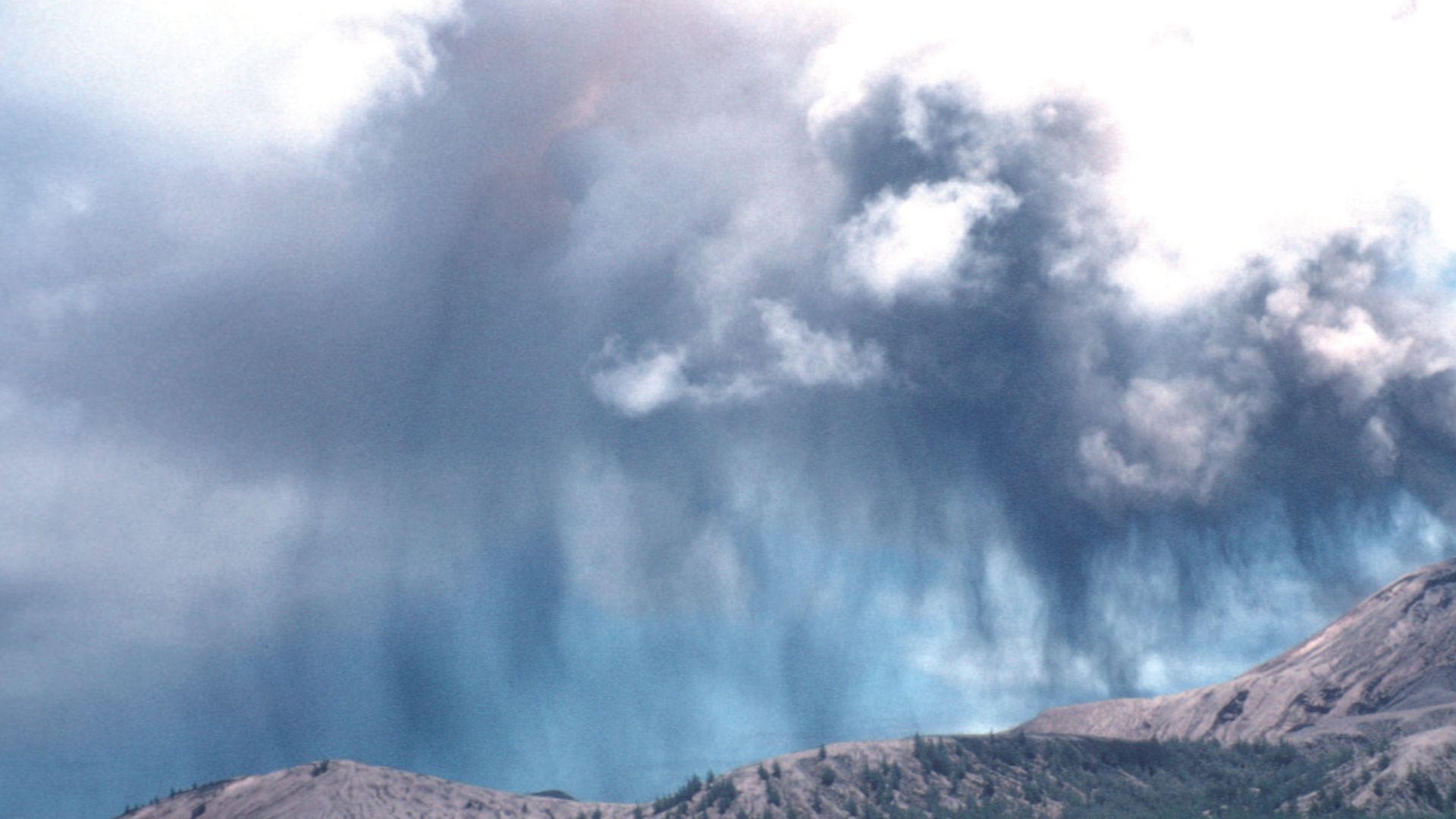 Ash plume and ash fall of May 1994 eruption of Mount Pagan volcano in Northern Mariana Islands.