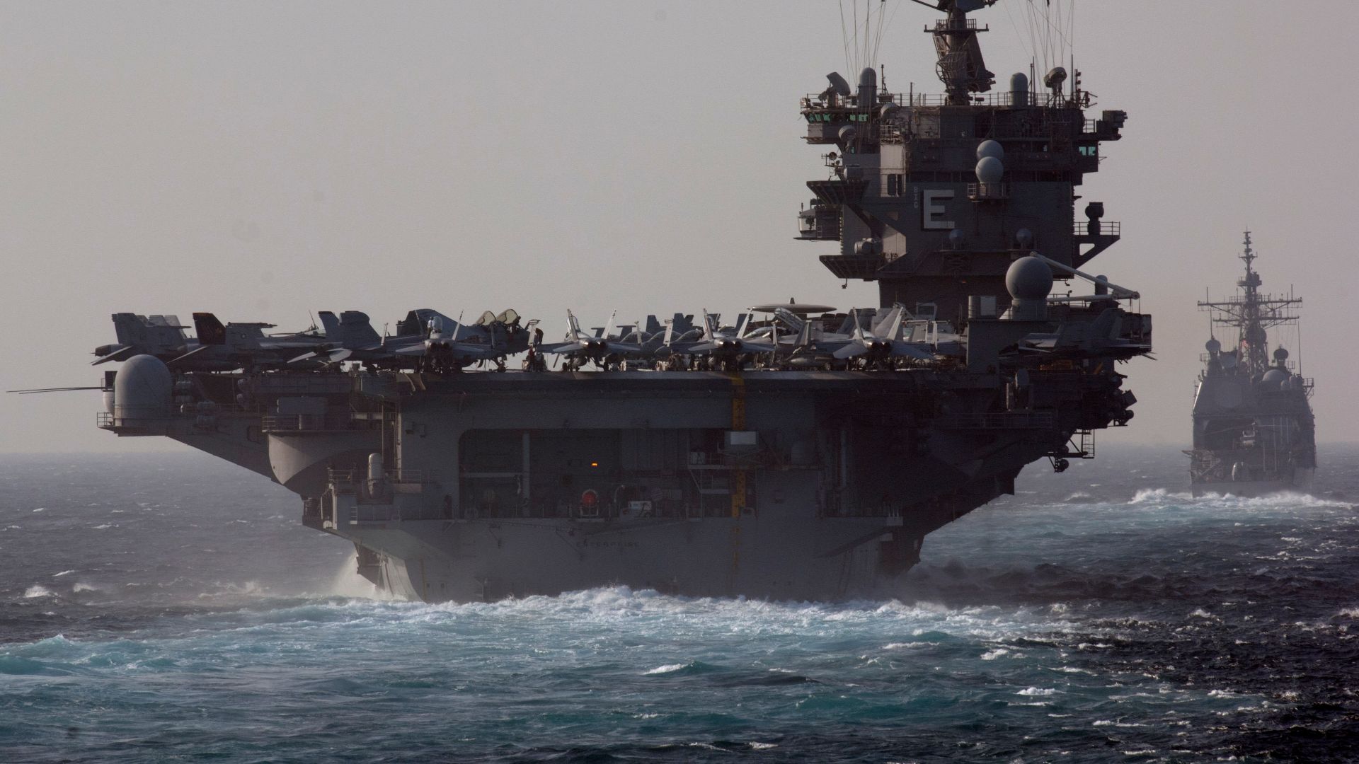 RED SEA (April 7, 2012) The aircraft carrier USS Enterprise (CVN 65) and the guided-missile cruiser USS Vicksburg (CG 69) transit the Bab el-Mandeb Strait. Enterprise and Vicksburg are deployed to the U.S. 5th Fleet area of responsibility conducting marit