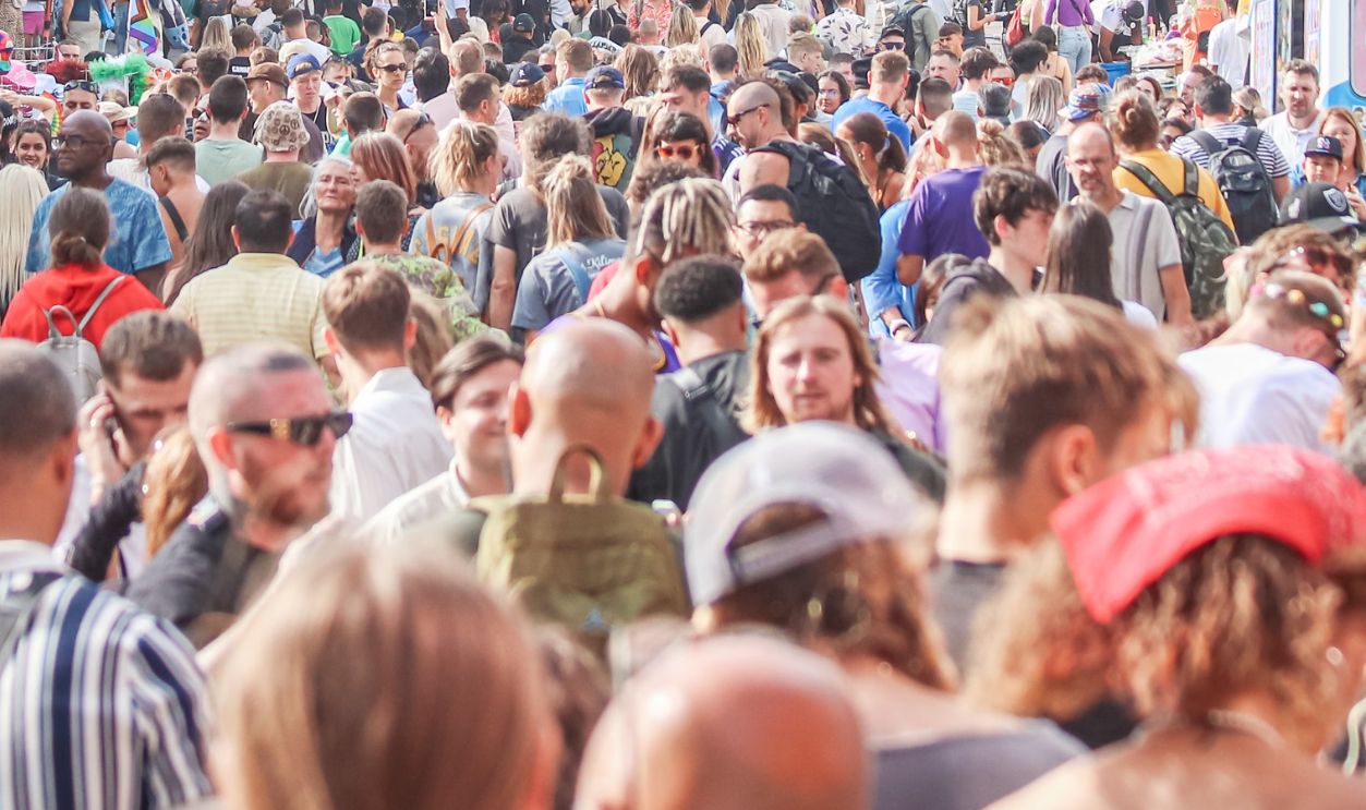 Vibrant crowd fills the streets of Bristol during a lively outdoor festival