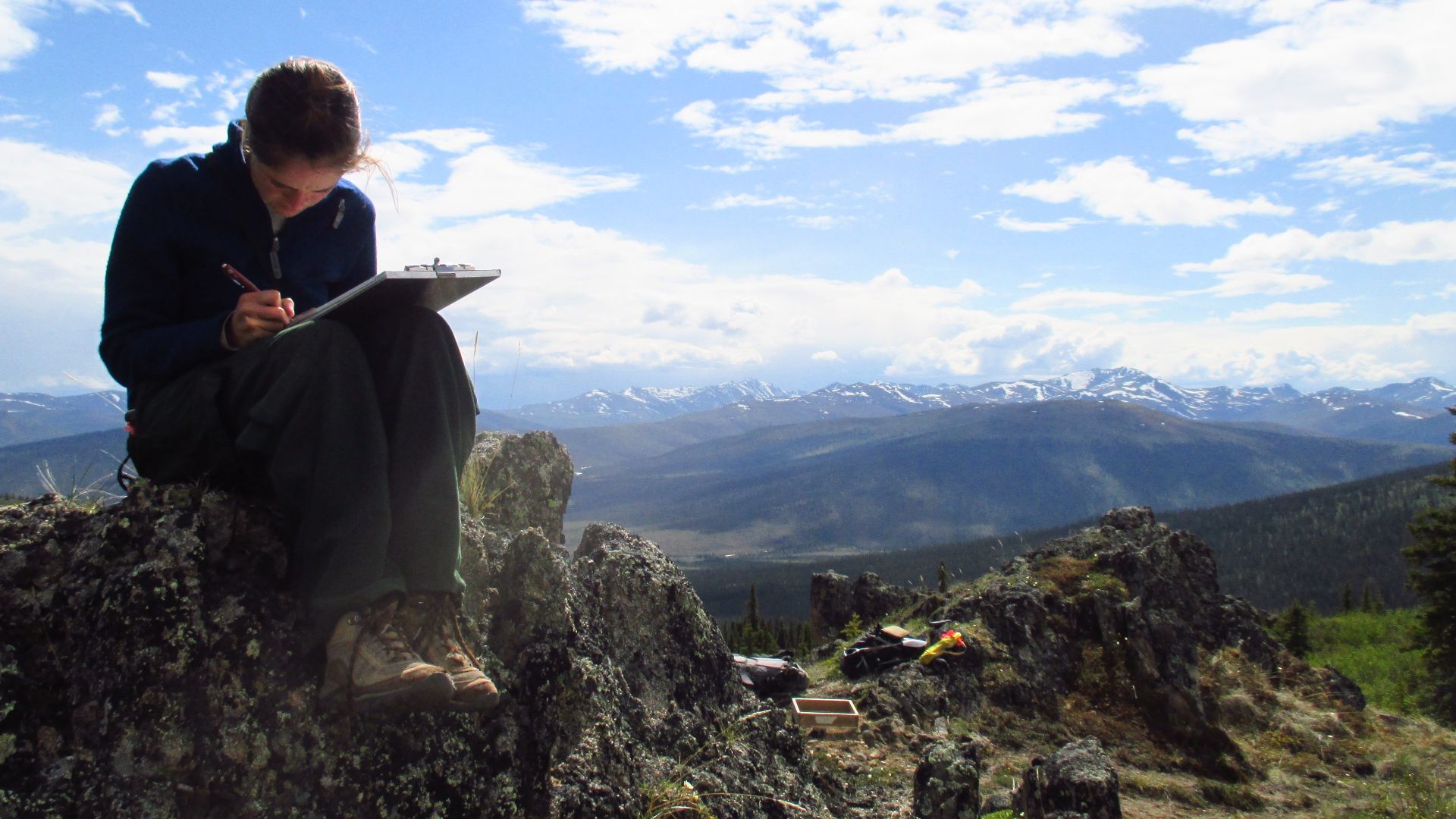 NPS Archeologist Jillian takes notes at a site in Yukon-Charley Rivers National Preserve.
NPS Photo / Greg Kinman 2013