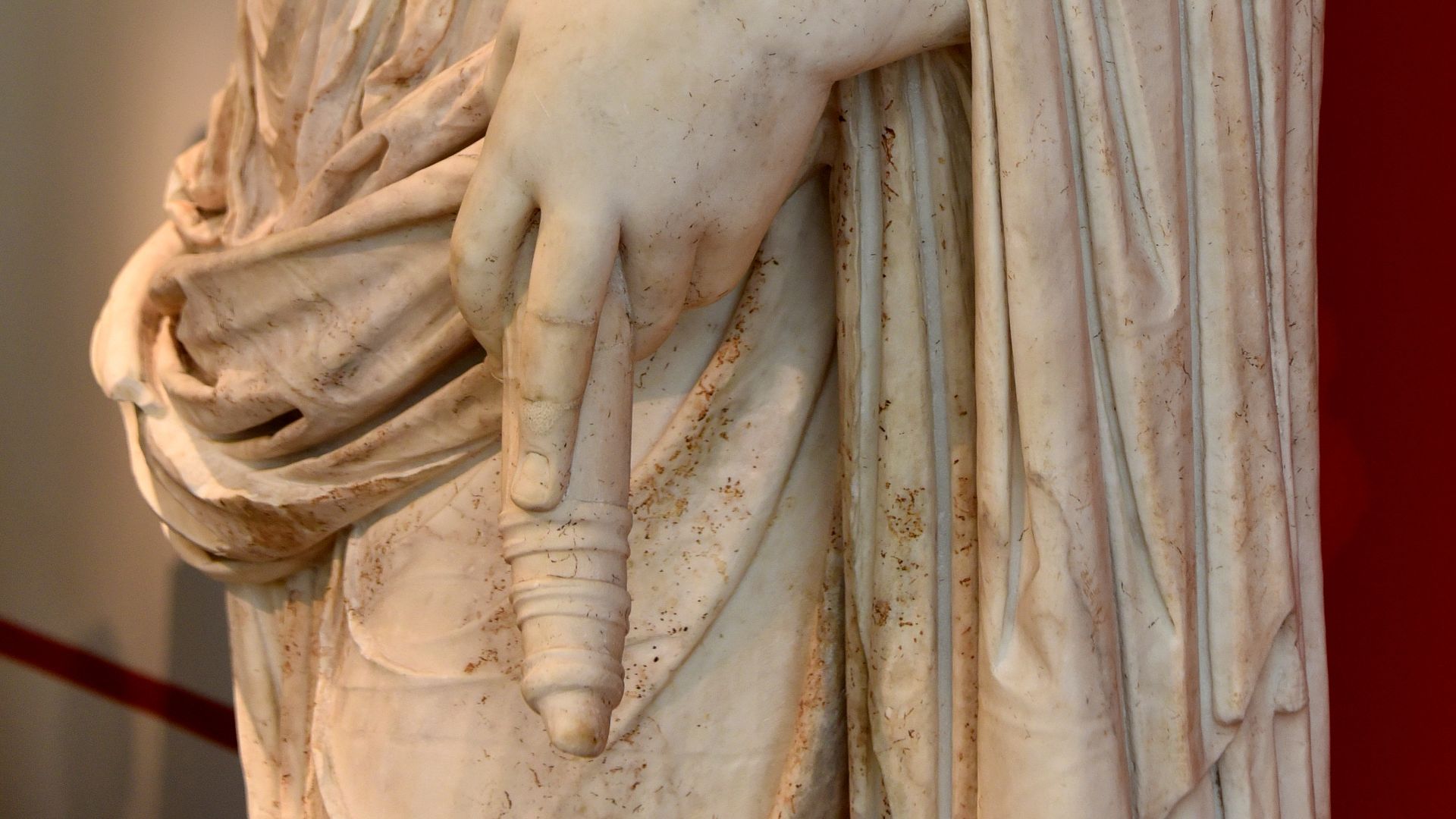Detail, cornucopia. Marble statue of deified empress Livia, holding a cornucopia, 42-52 CE. Acquired in 1842 CE, Theatre of Falerii, Italy. Altes Museum, Berlin, Germany.
