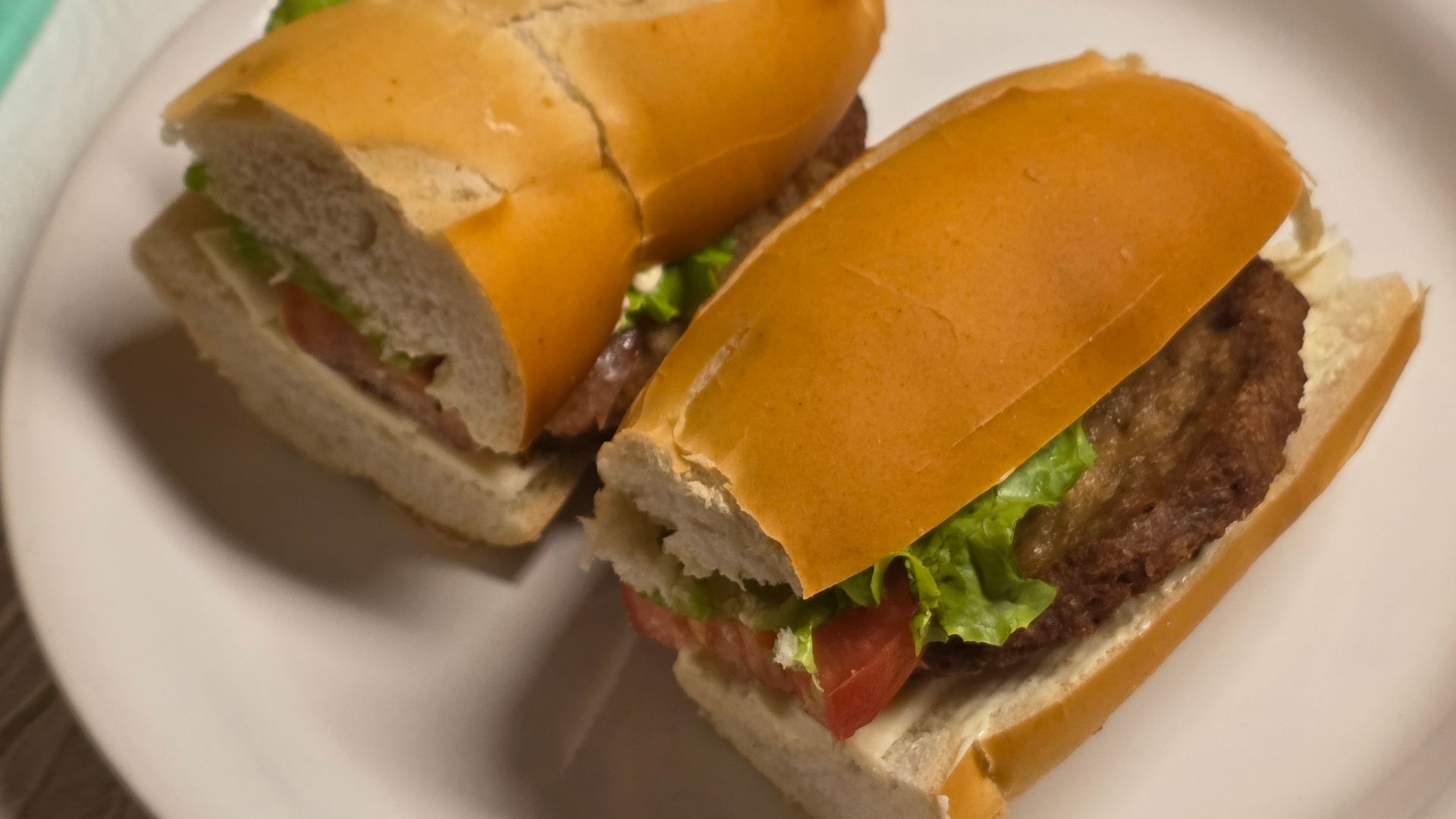 Top view of two milanesa sandwiches (popularly known in Argentina as