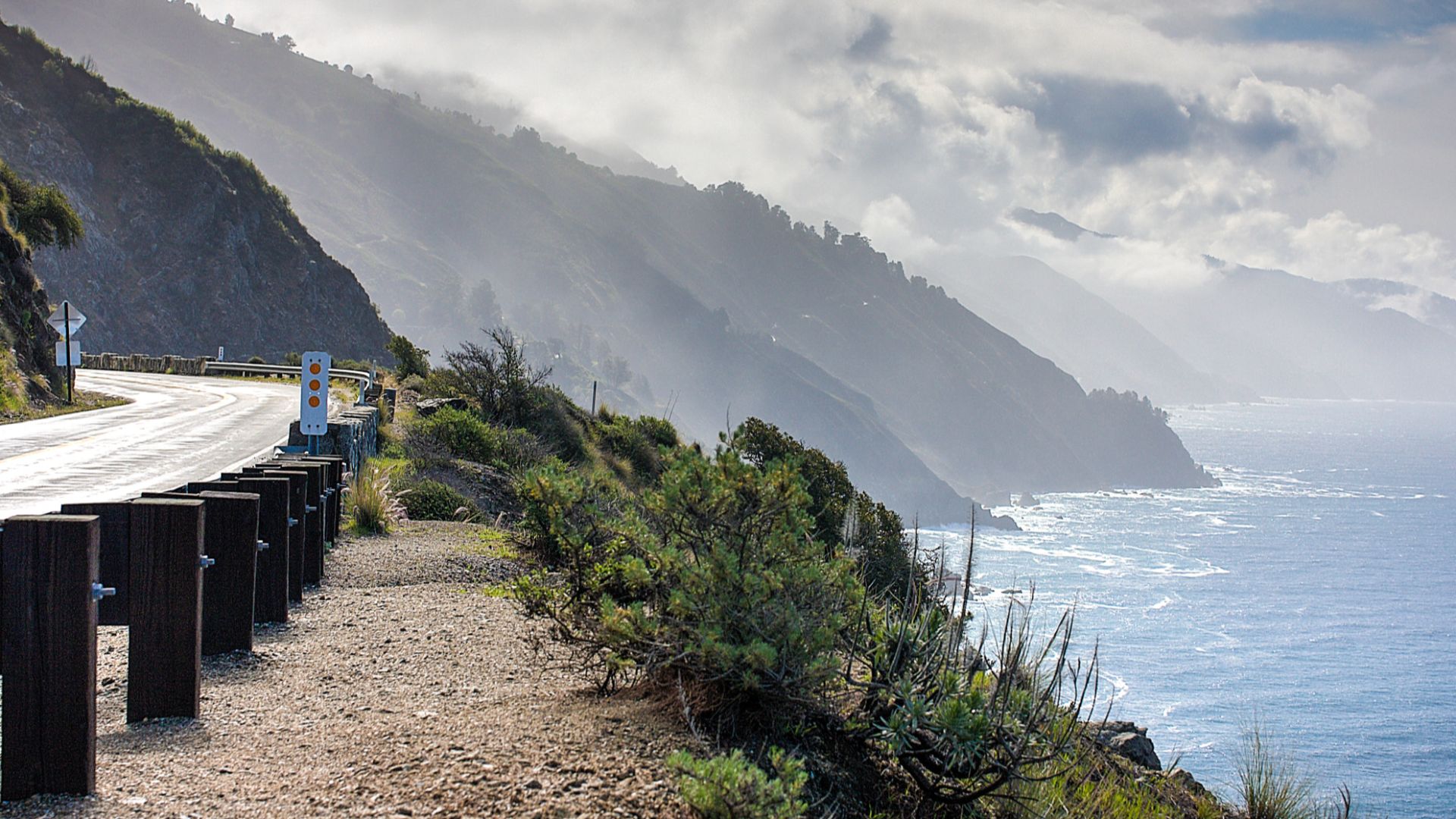 500px provided description: Pacific Coast Highway, California [#landscape ,#water ,#coast ,#highway ,#road ,#california ,#pacific ,#overcast]