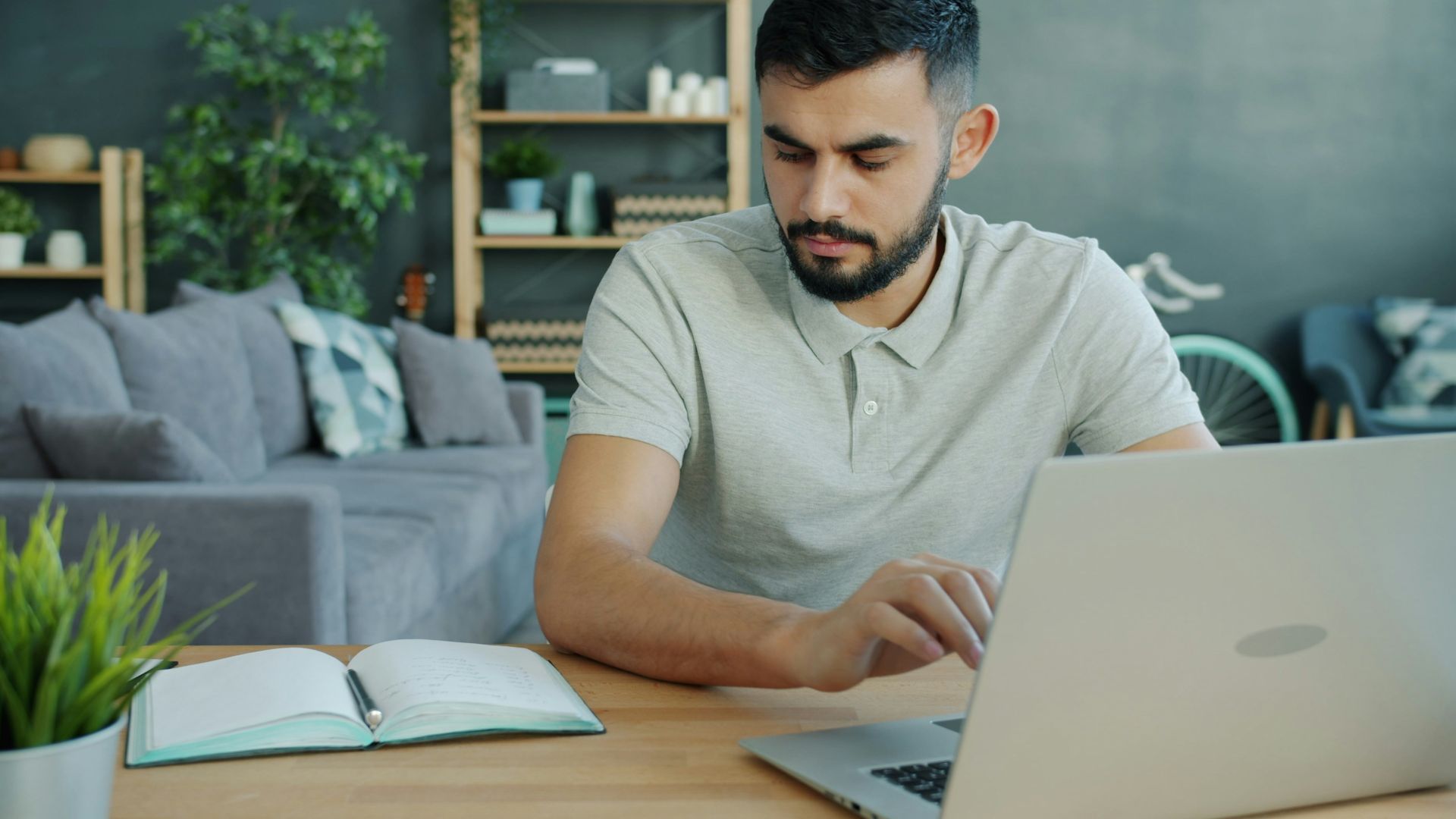 Man working on a laptop at a desk
