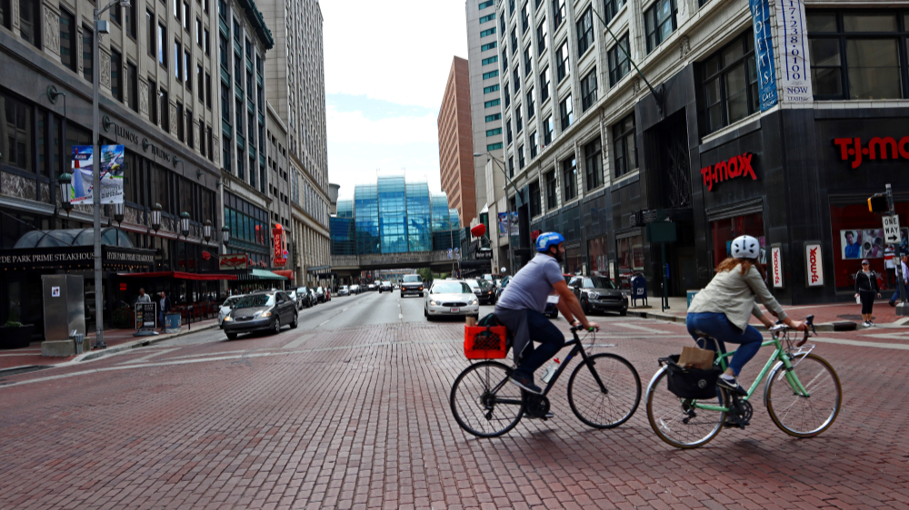 Bicyclists passing a street in Indianapolis, Indiana