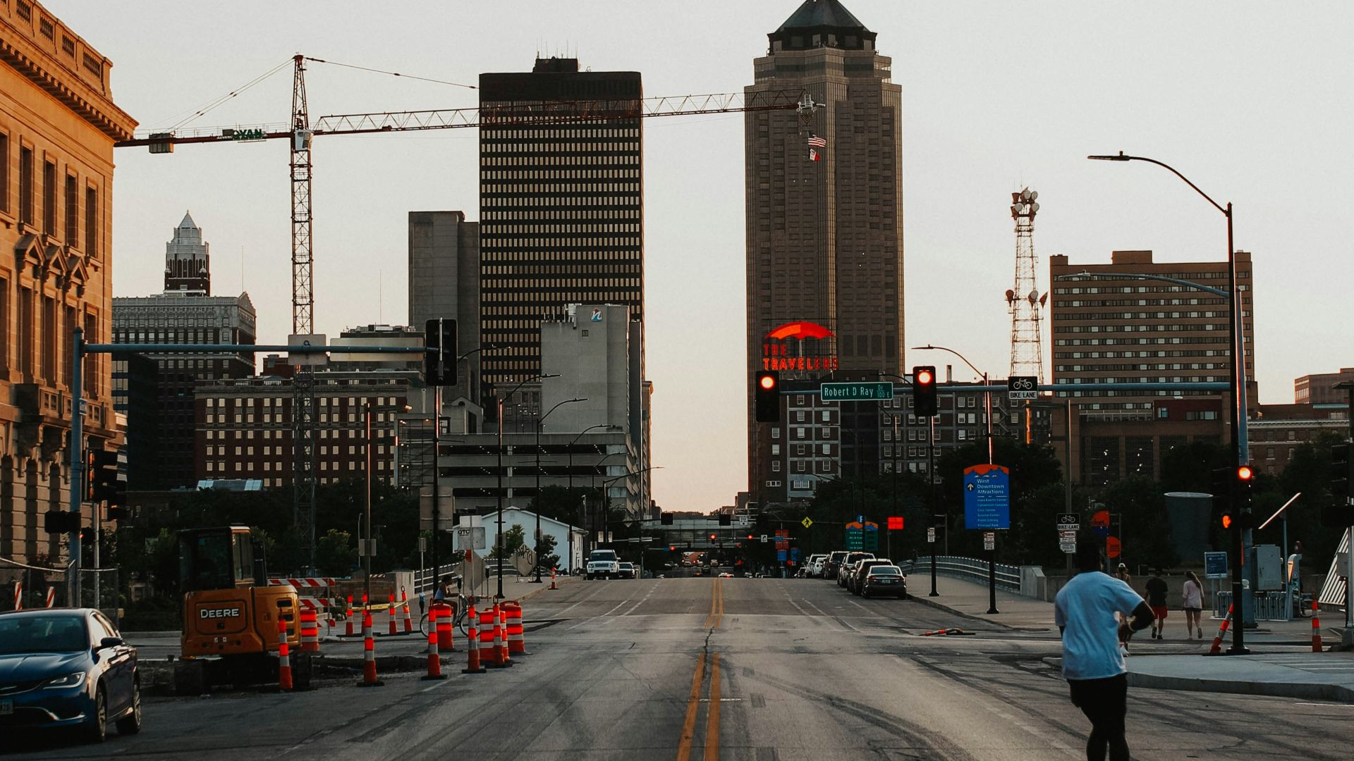 cars on road near buildings during daytime