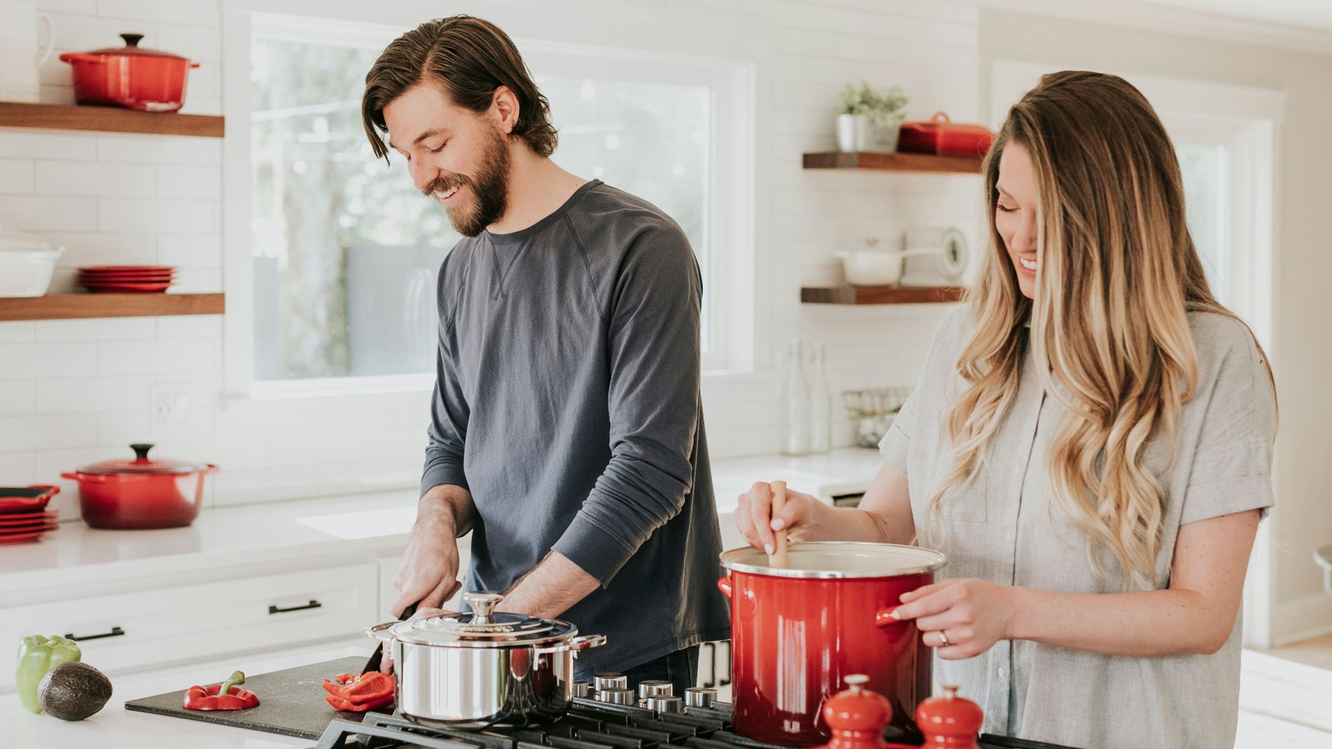 man and woman on kitchen