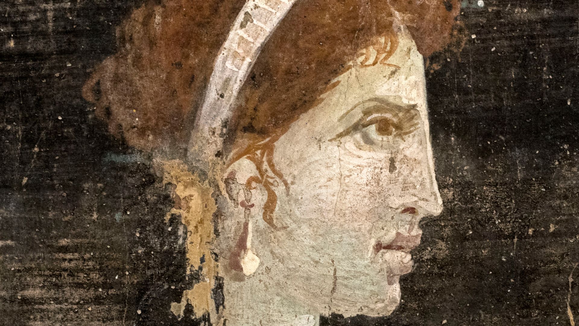 A posthumous painted portrait of Cleopatra VII of Ptolemaic Egypt from Roman Herculaneum, made during the 1st century AD, i.e. before the destruction of Herculaneum by the volcanic eruption of Mount Vesuvius; it is located in the National Archaeological M