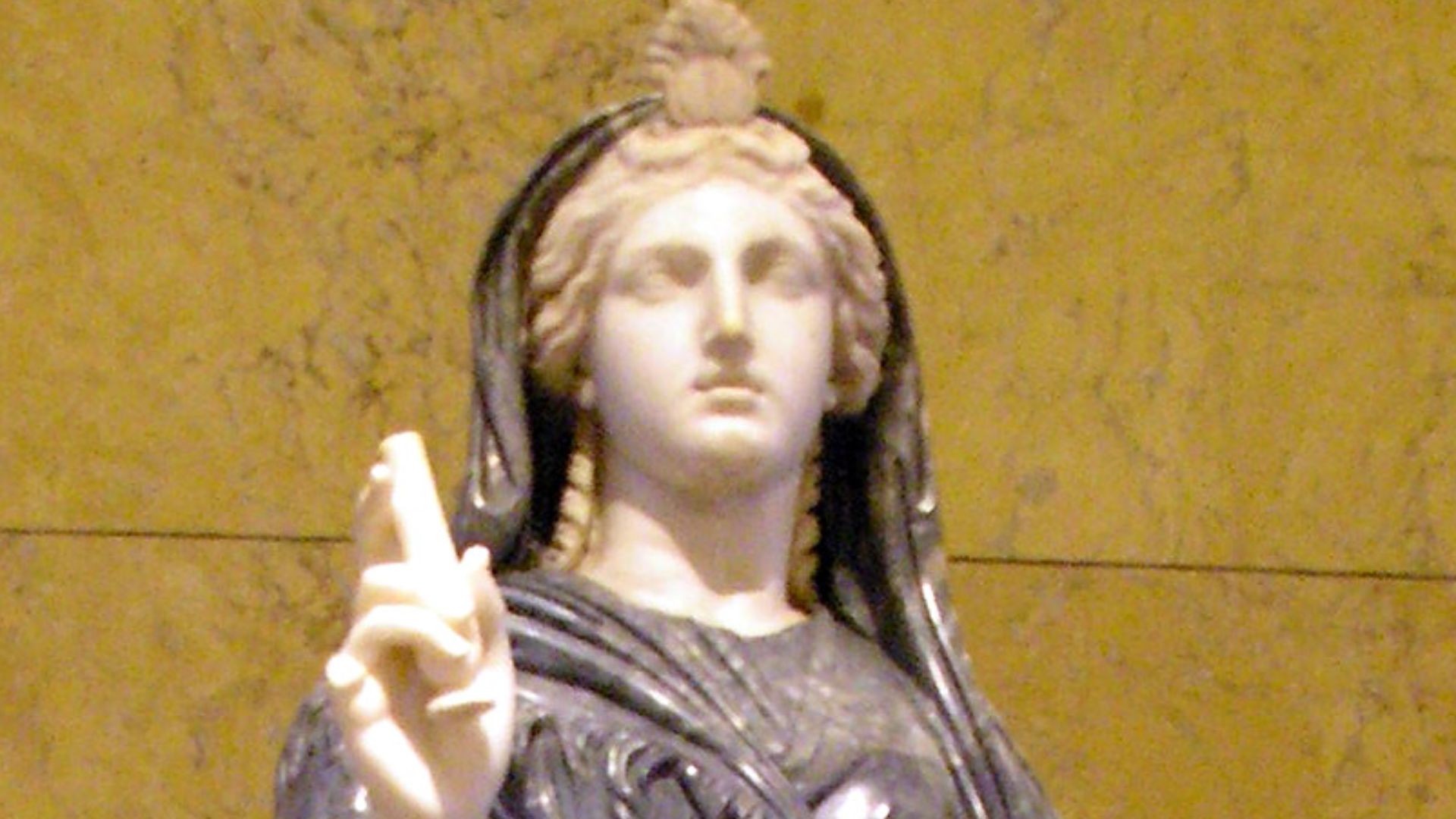 Ancient Roman statue of Isis, in the Collection of Greek and Roman Antiquities in the Kunsthistorisches Museum, Vienna. First half of the 2nd century, found in Naples, Italy. Made out of black and white marble. Inv. # I 158. Isis, originally an Egyptian g