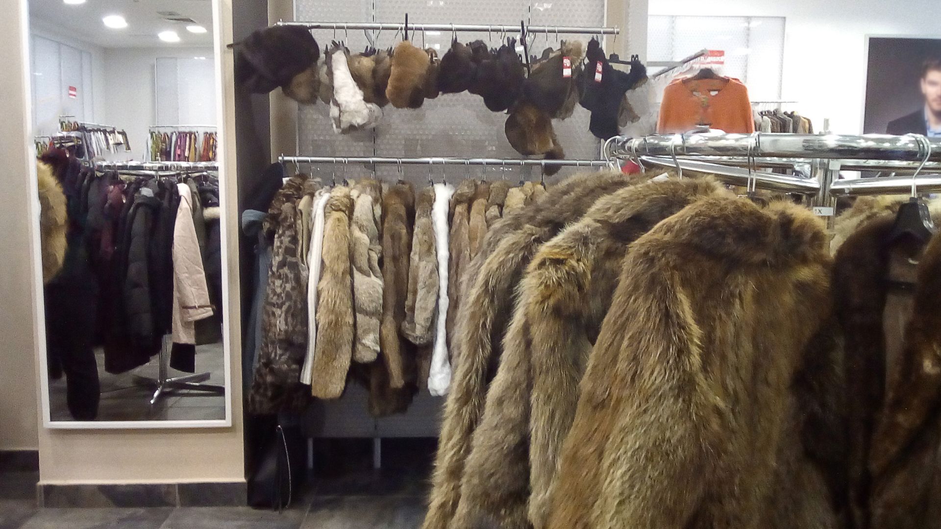 Fur clothing in secondhand shop in Prague (branch of Slovakian commercial vintage/secondhand store brand Textile house)