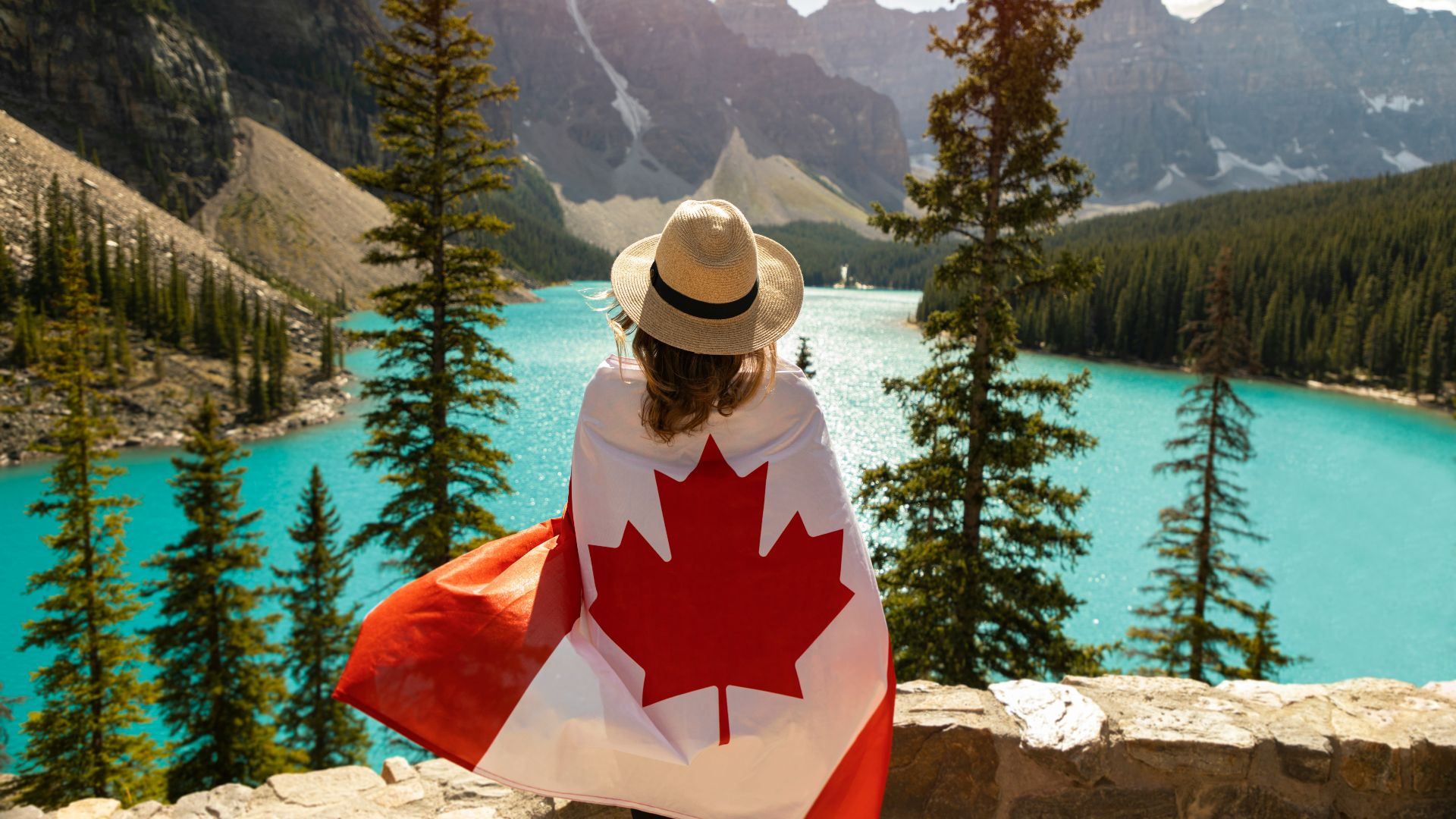 a woman with a canadian flag on her back