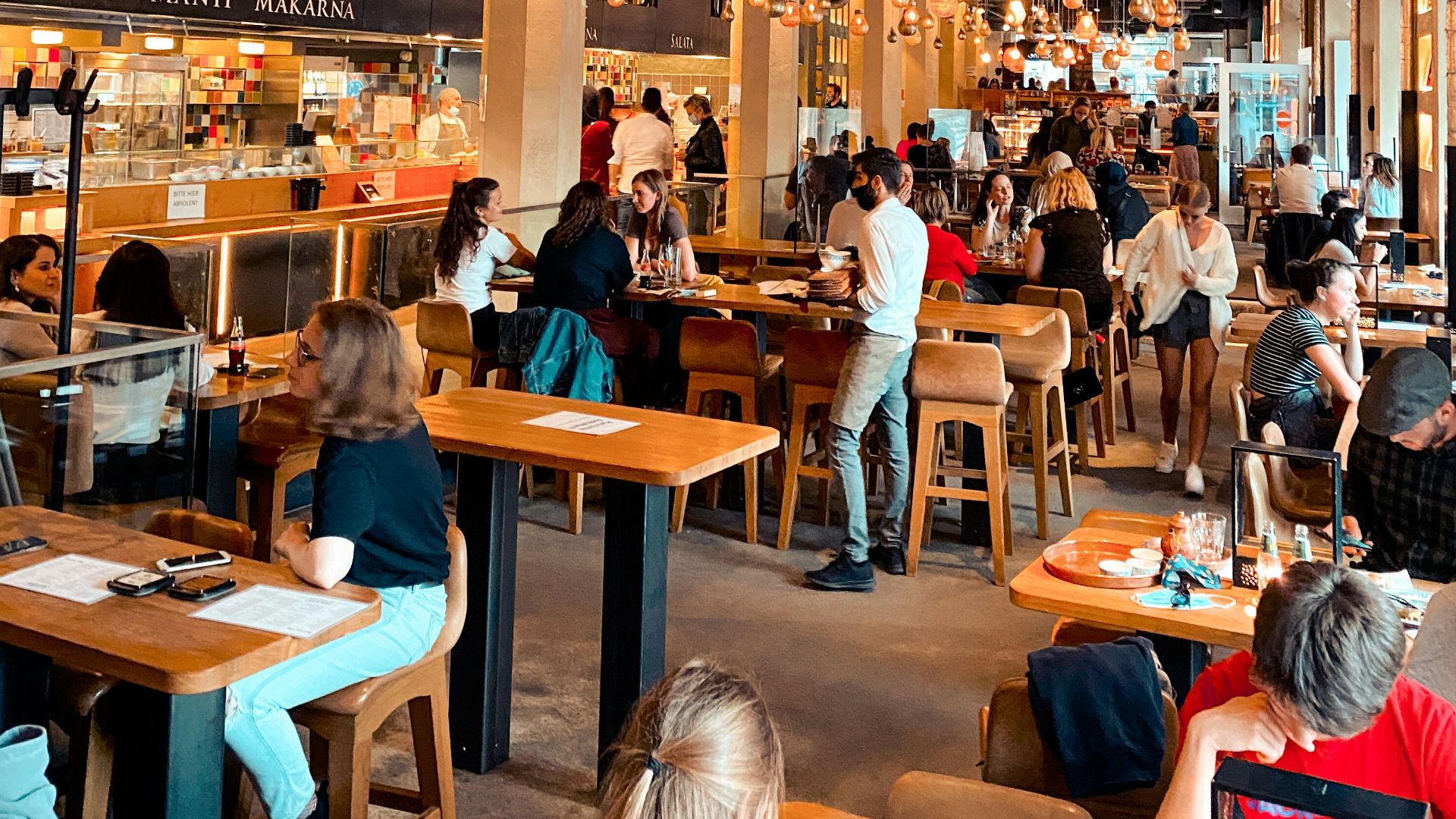 people sitting on chair in restaurant