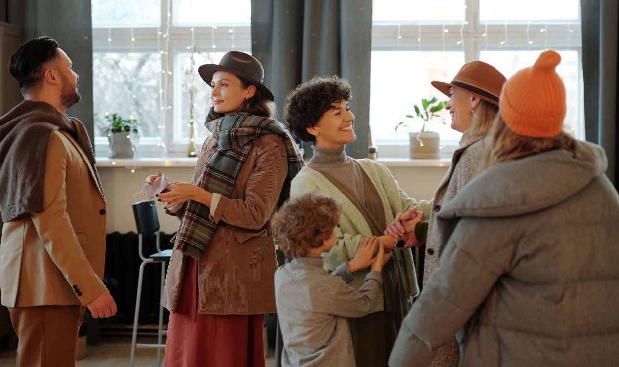 A warm family gathering indoors celebrating the holiday season with joy