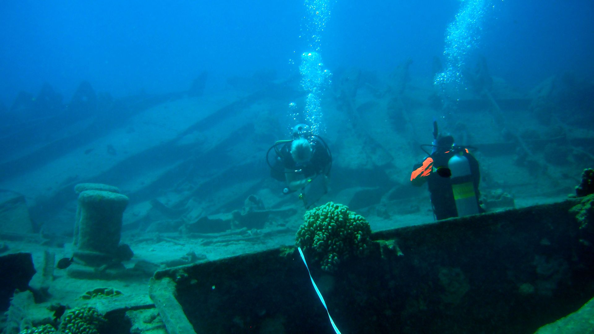 Archaeologists surveying the sunken auxiliary vessel on the Maritime Heritage Trail - Battle of Saipan, Tanapag Lagoon. Presumably the torpedoed Shoan Maru.