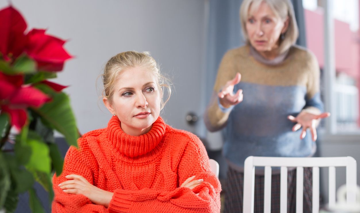 Elderly mother swears at an adult daughter during a domestic quarrel
