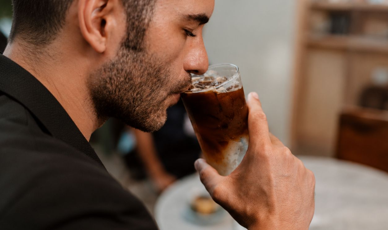 drinking iced coffee