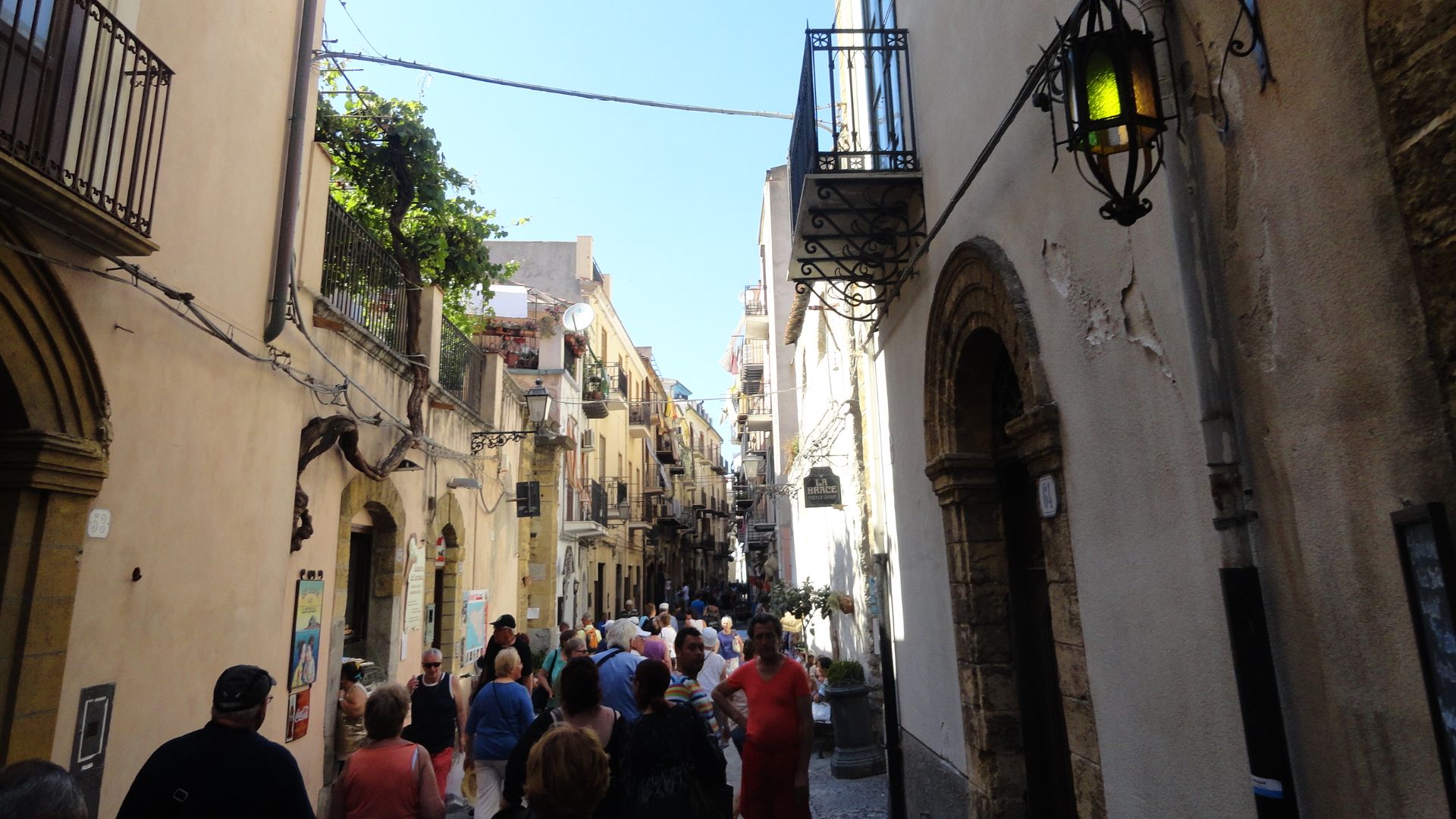 Via 25 Novembre - You will meet many tourists in Cefalù, Sicily, Italy. This is an example of a packed with tourists street.
By the founder of www.fashionologymag.com