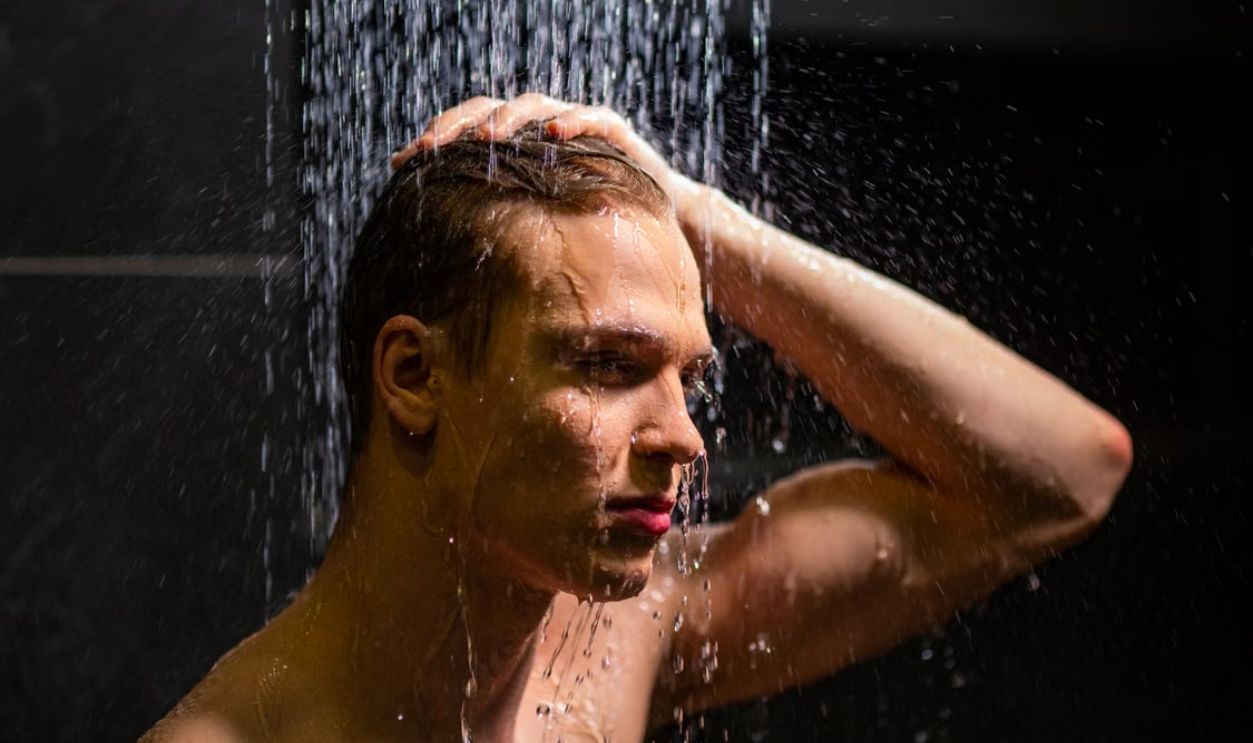 man showering