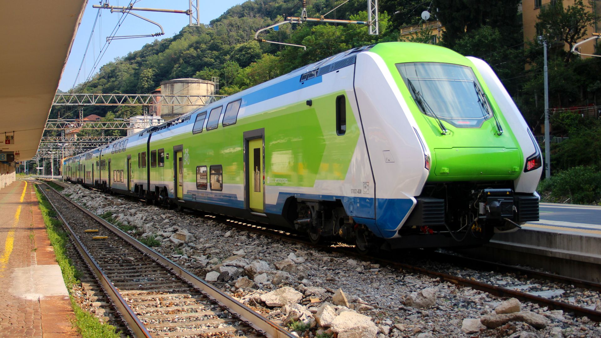 A brand-new Hitachi Caravaggio electric unit operated by Trenord waits at Como San Giovanni, ready to work a suburban service South to Milano Porta Garibaldi.