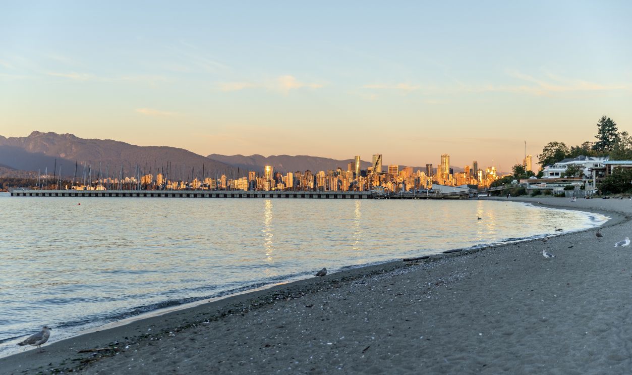 A stunning sunset view of downtown Vancouver, British Columbia, captured from Sunset Beach.
