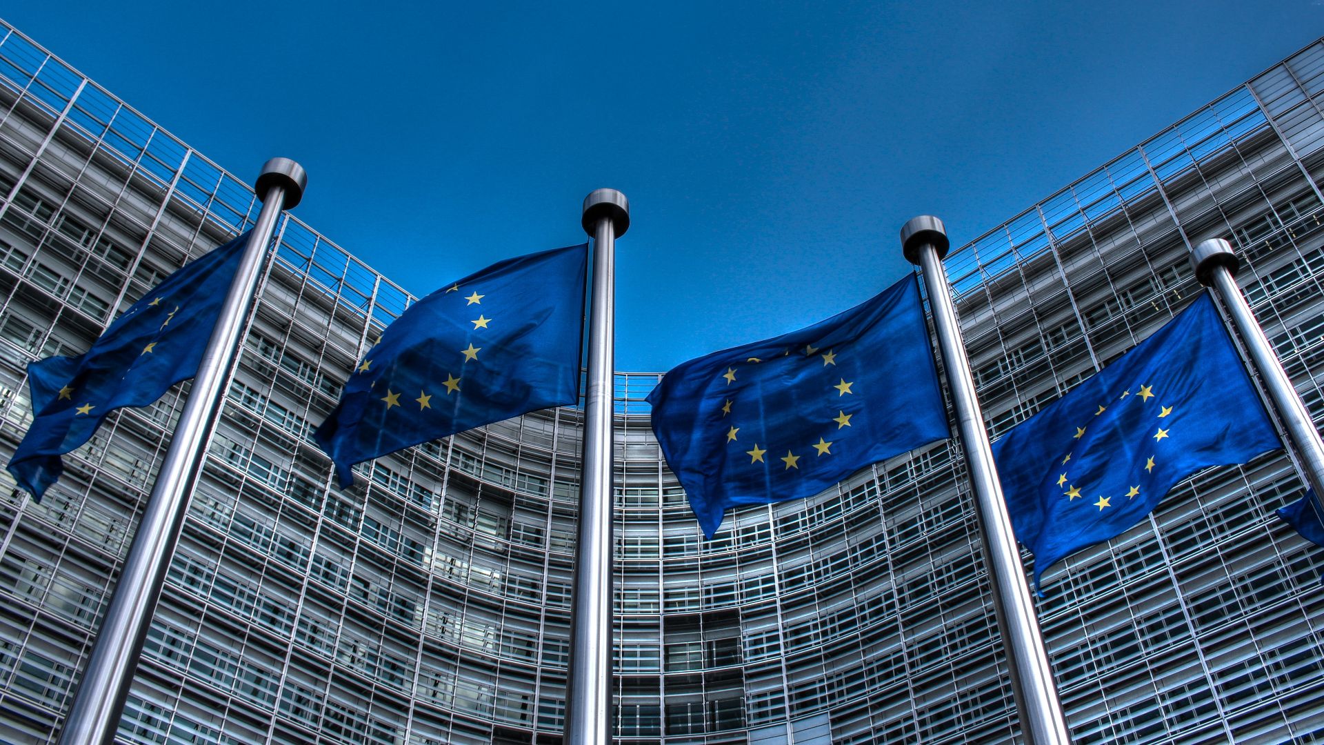 European Union flags in front of the Berlaymont Building, Brussels