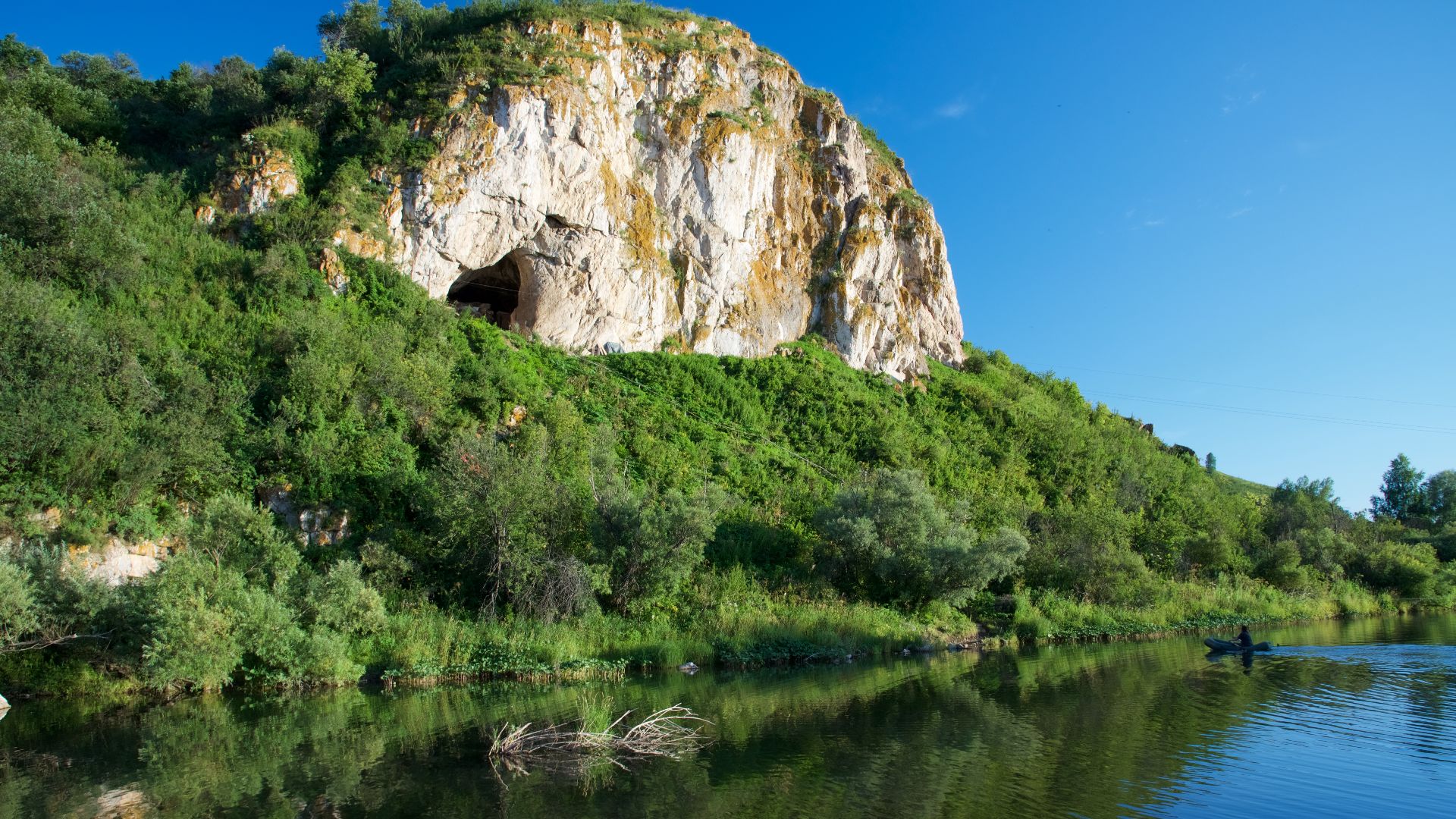 View of the Neanderthal site Chagyrskaya cave, Alta Mountains, Russia.