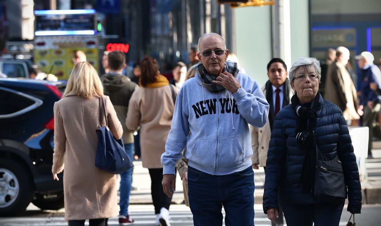 NEW YORK CITY - NOV 11: People walk along a busy downtown Manhattan street on Nov 11, 2015 in New York City, USA. Manhattan is home to 1.6 mln New Yorkers with a population density of 71,671/sq mi.