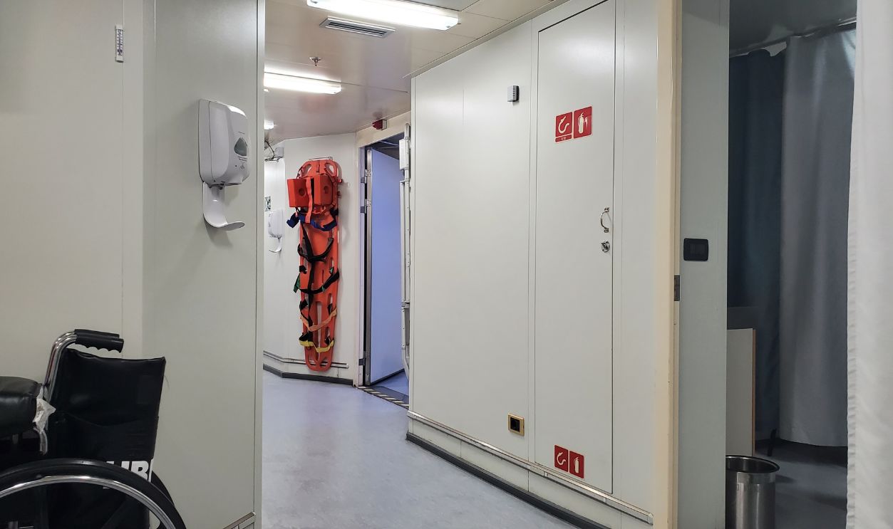 Cruise ship medical center office during. Crew members Medical center