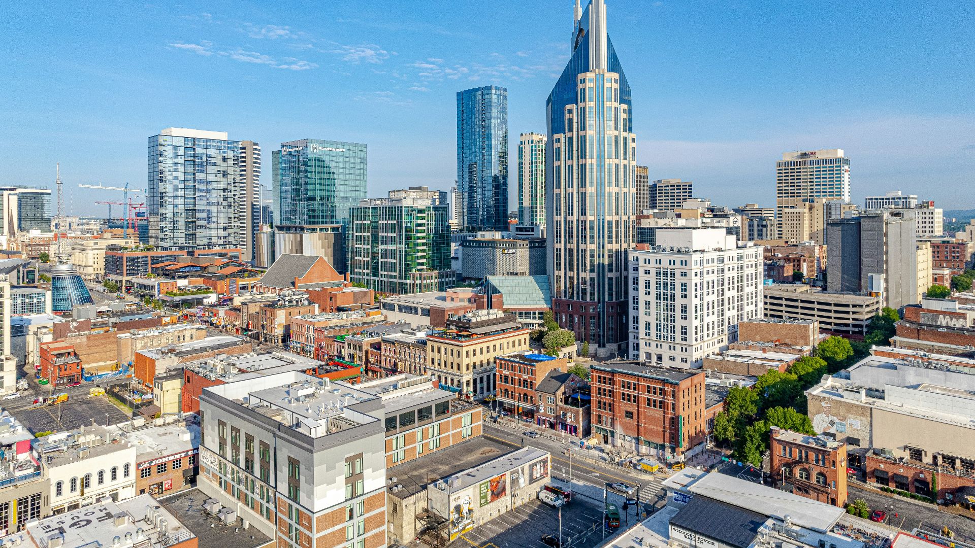 a view of a city with tall buildings