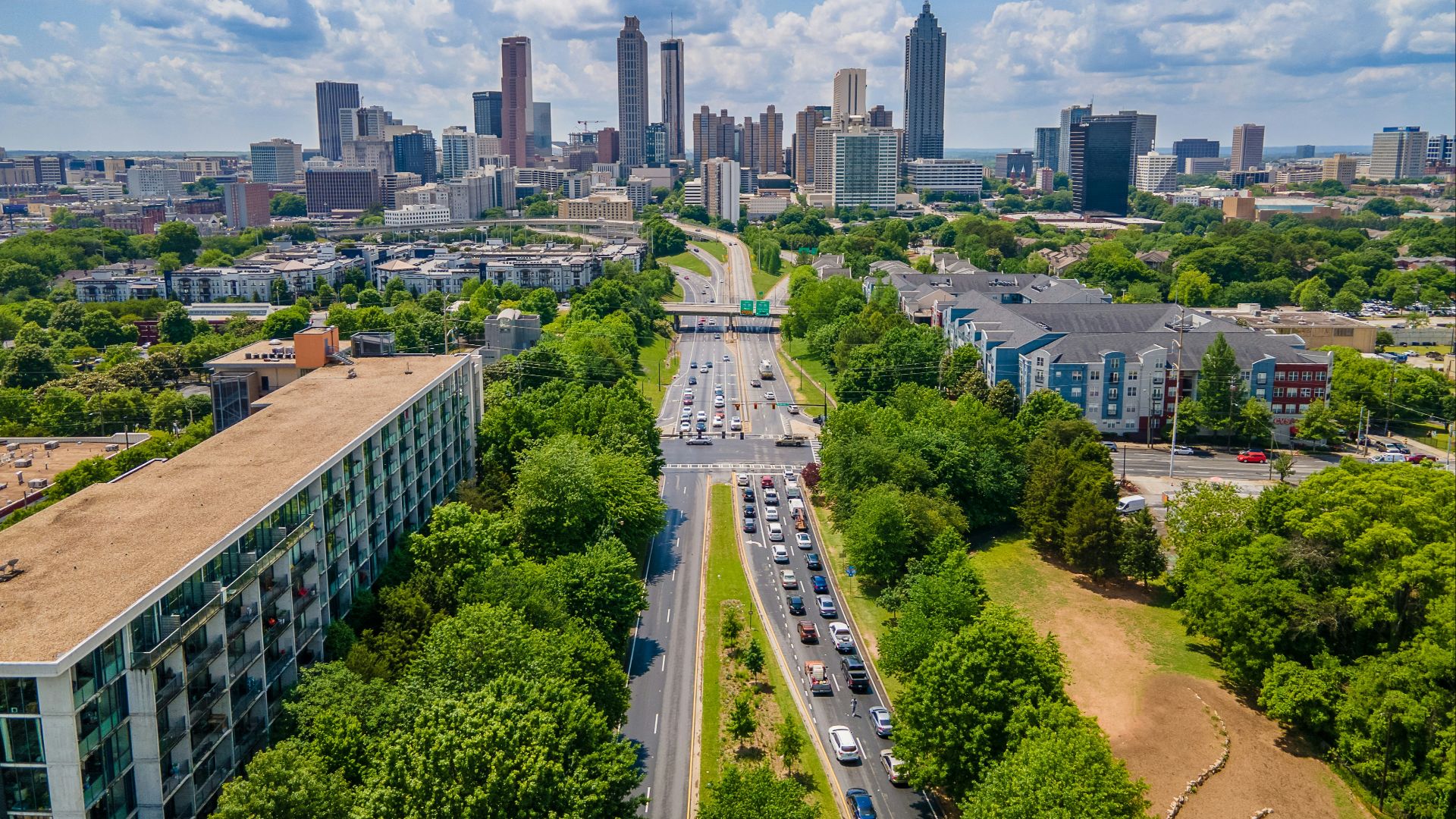 An aerial view of a city with tall buildings