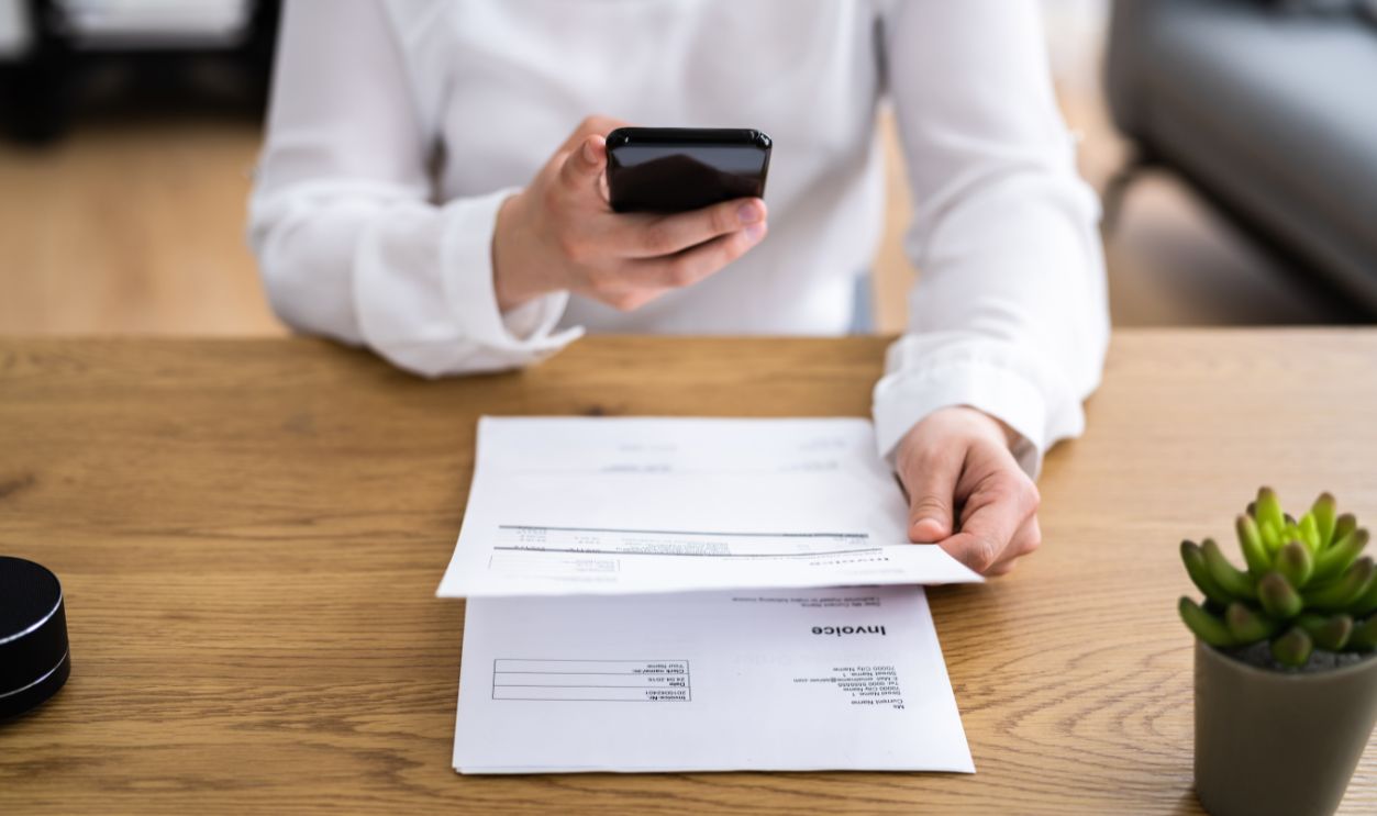 Taking Invoice Document Photo Using Phone Or Smartphone