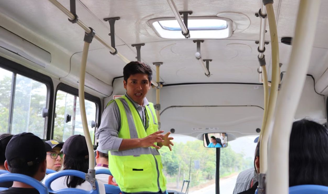 A tour guide on a bus