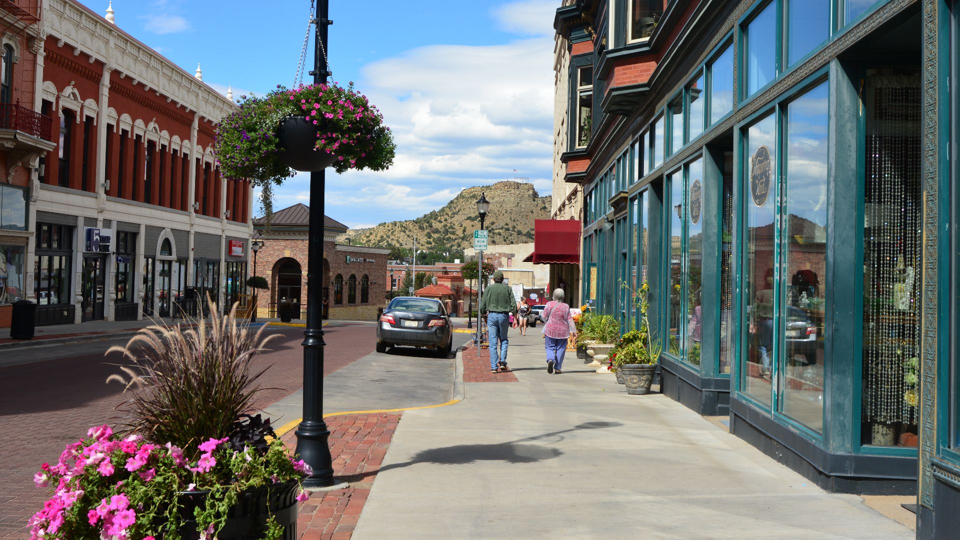 N. Commercial St. from E. Main St., Trinidad, Colorado, McCormick Building, 101-113 E. Main St. at right. Simpsons Rest in the distance.