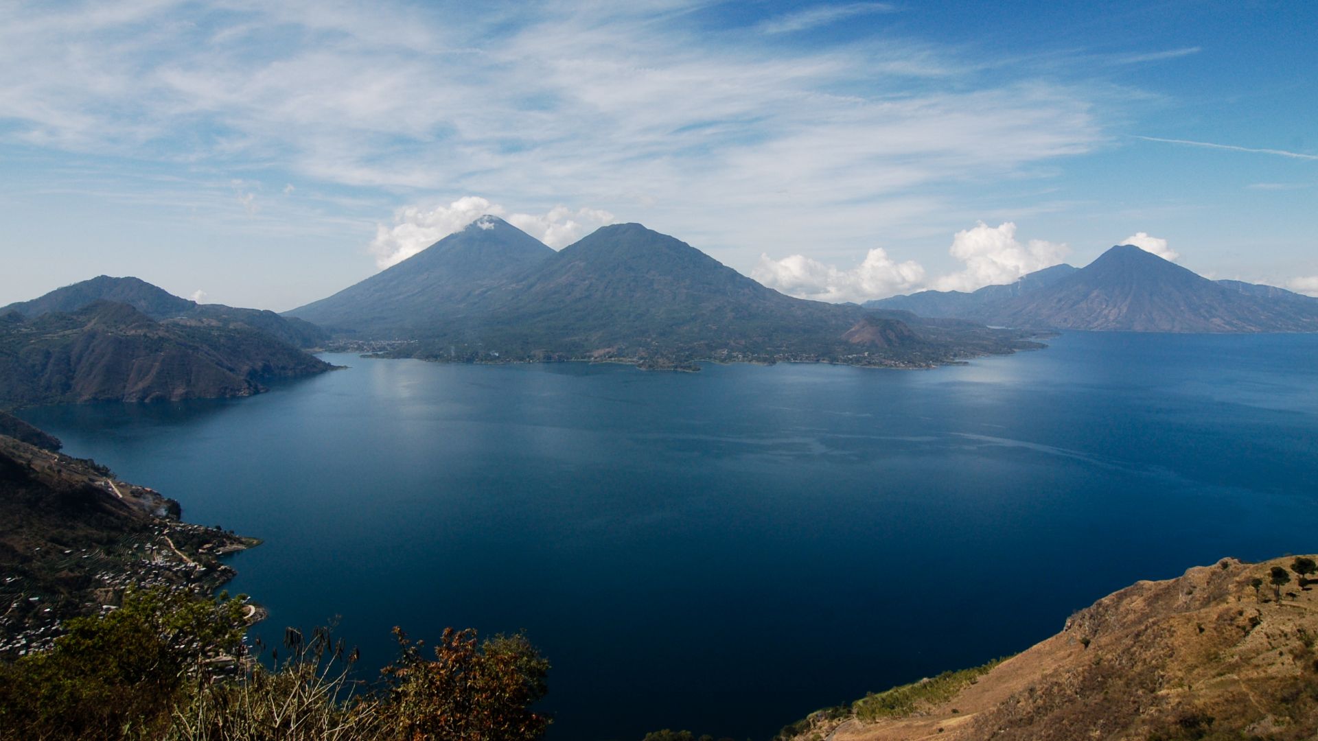 lake Atitlan, Guatemala. From right to left: San Pedro volcano, Tolimán and Atitlán volcano.