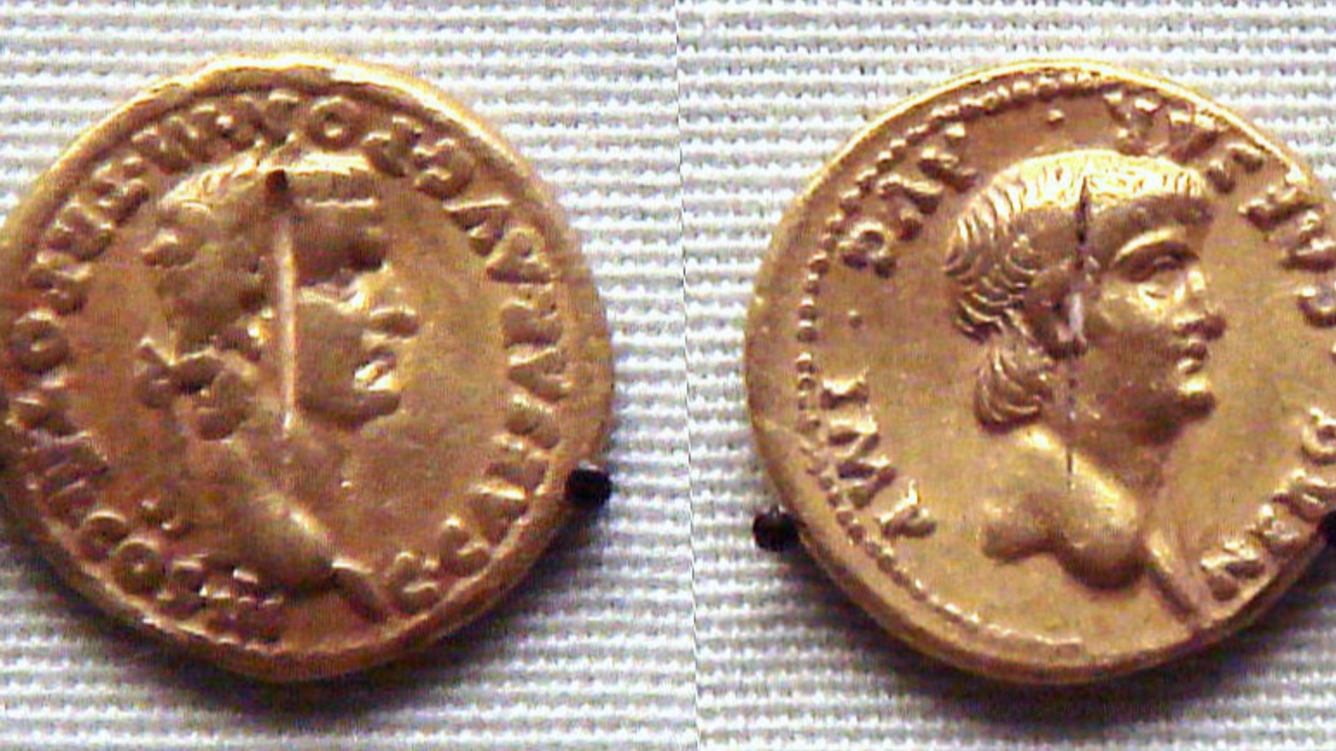 Roman_gold_coins_excavated_in_Pudukottai_India_one_coin_of_Caligula_31_41_and_two_coins_of_Nero_54_68.