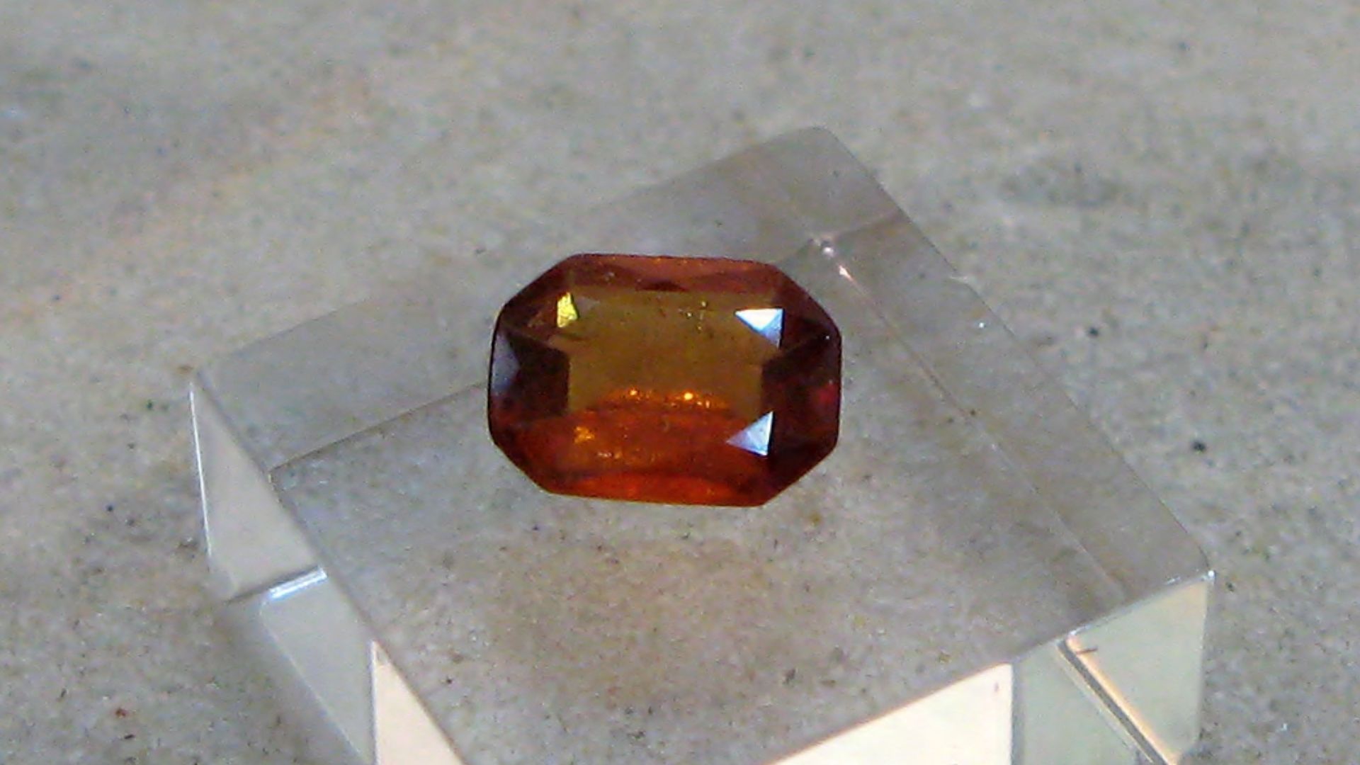 Hessonite, variety of Grossular out of the garnetgroup, table cutting - Locality: Ceylon - Exposed in the Mineralogical Museum, Bonn, Germany