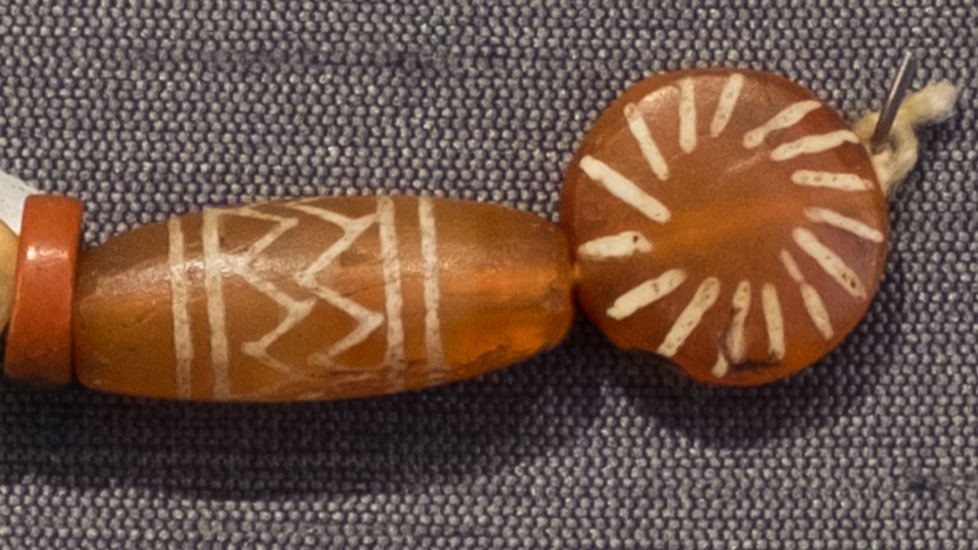 Etched carnelian beads (India).Nilgiri Hills culture, 1st millenium CE
