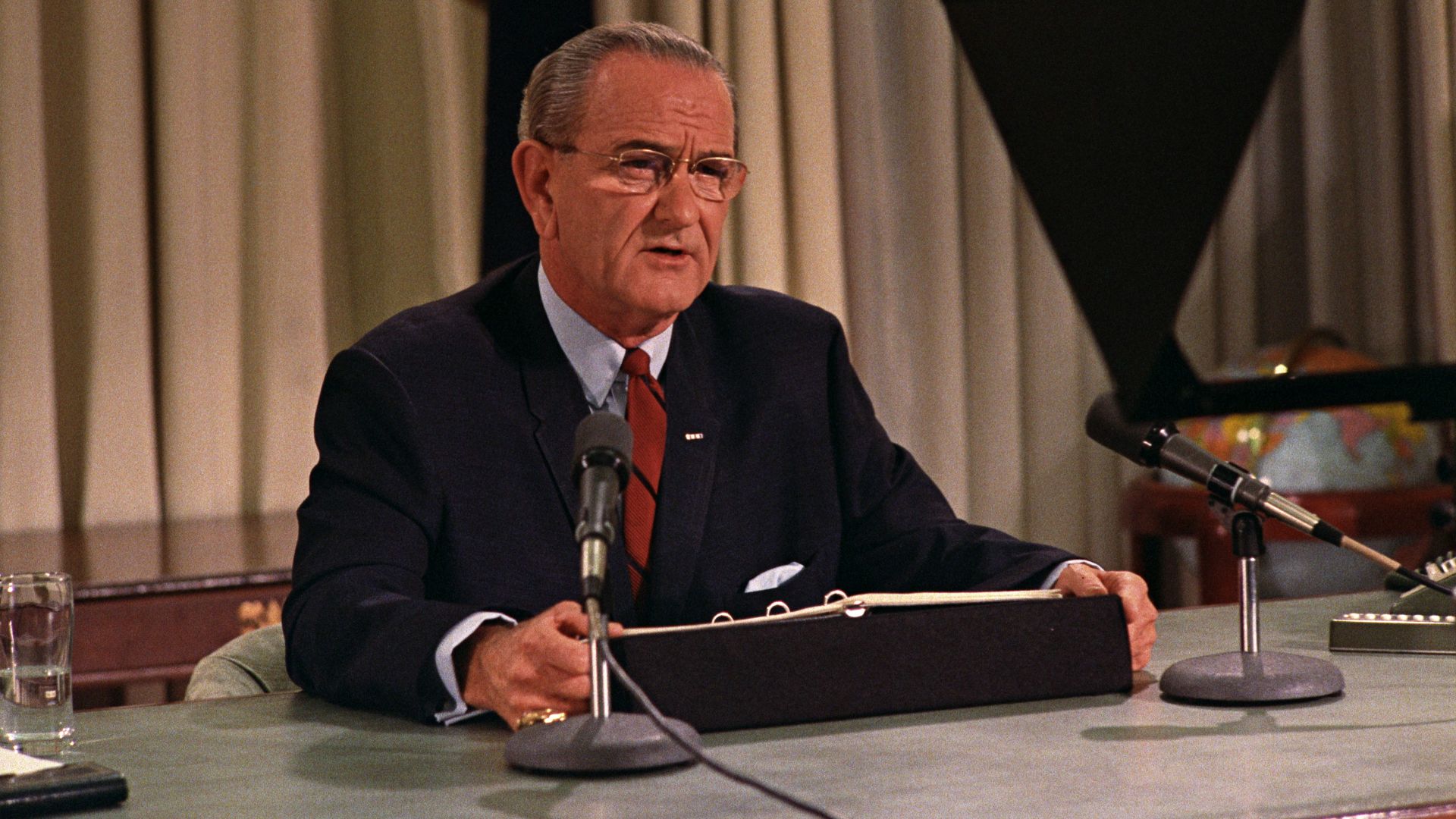 Lyndon B. Johnson speaks to nation on TV on March 31, 1968, announcing a bombing halt in Vietnam and his intention not to run for re-election.