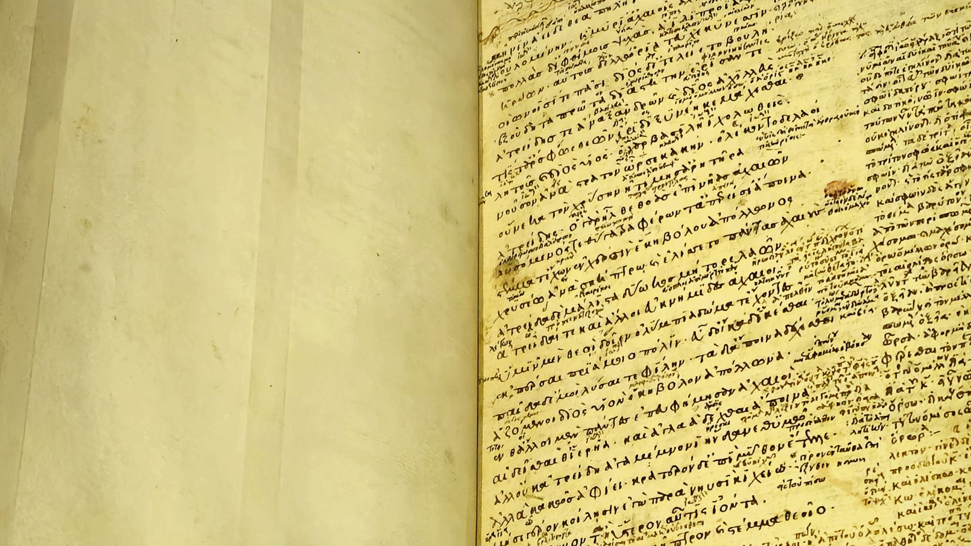 14th-century manuscript of Homer's Iliad.  The manuscript has notes and glosses in the margin by unknown readers.