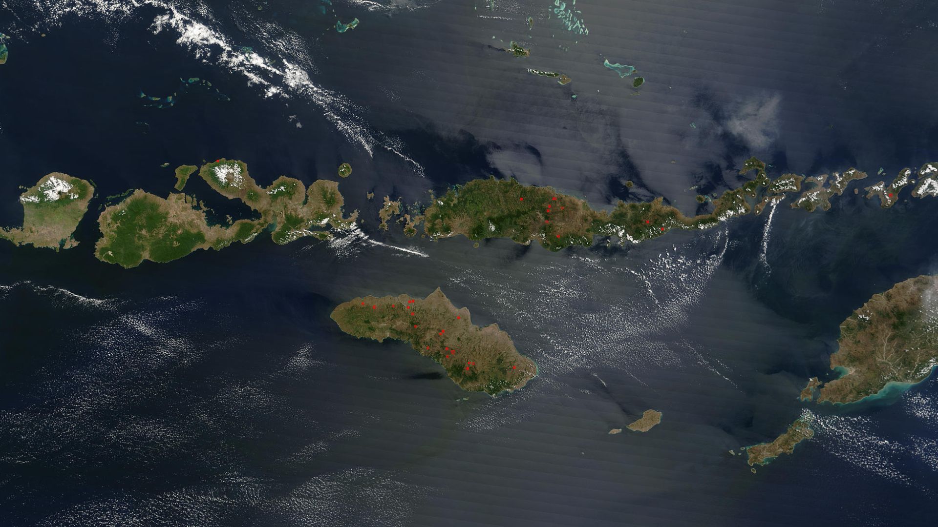 The Lesser Sunda Islands, Indonesia Forming the southern arc of central Indonesia, the Lesser Sunda Islands link the island of Java (west) to the island of Timor (east). The islands stretch 1,200 kilometers west to east, and traverse the waters of the Tim