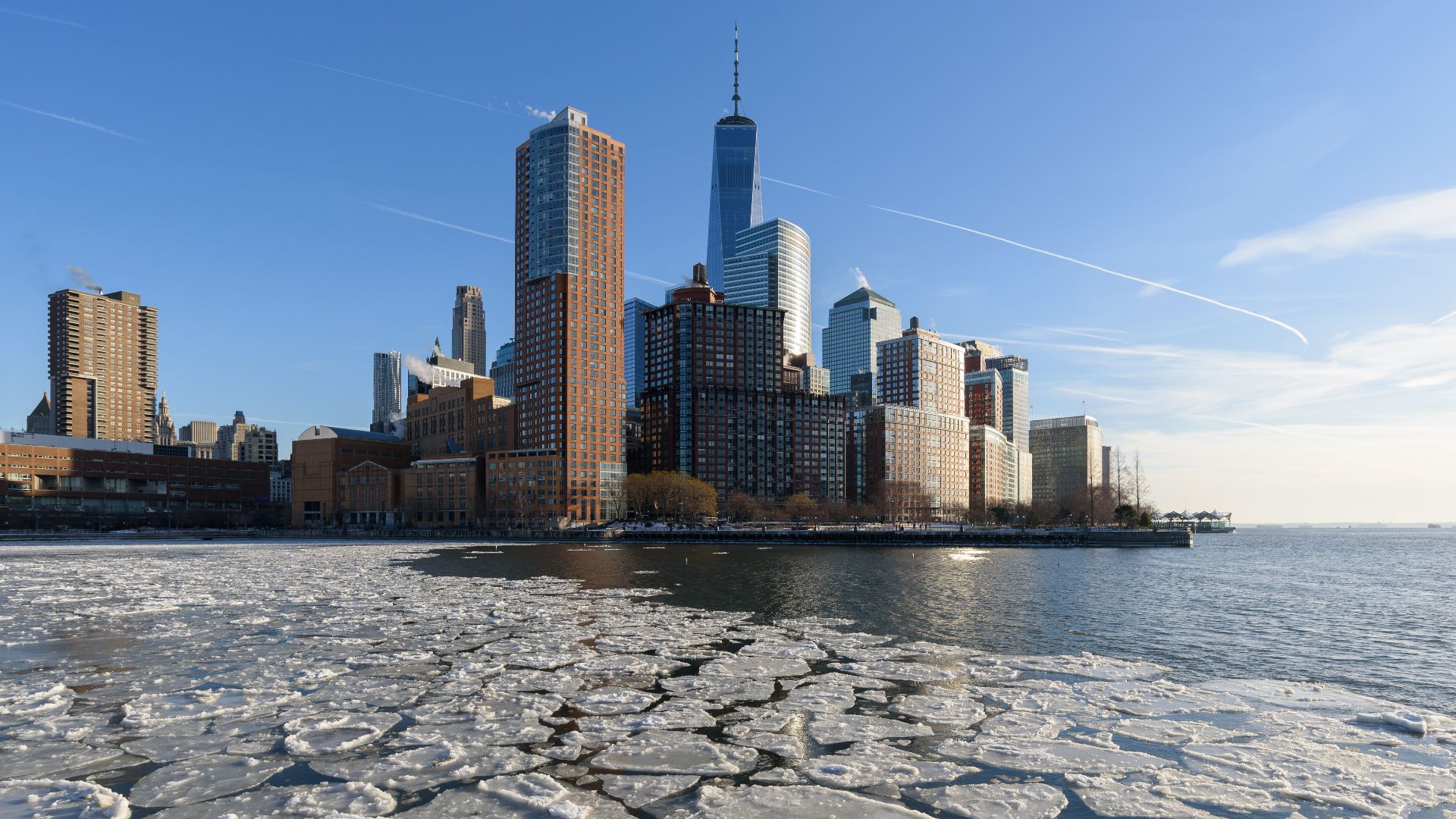 Battery Park City skyline over a frozen Hudson River, New York City.