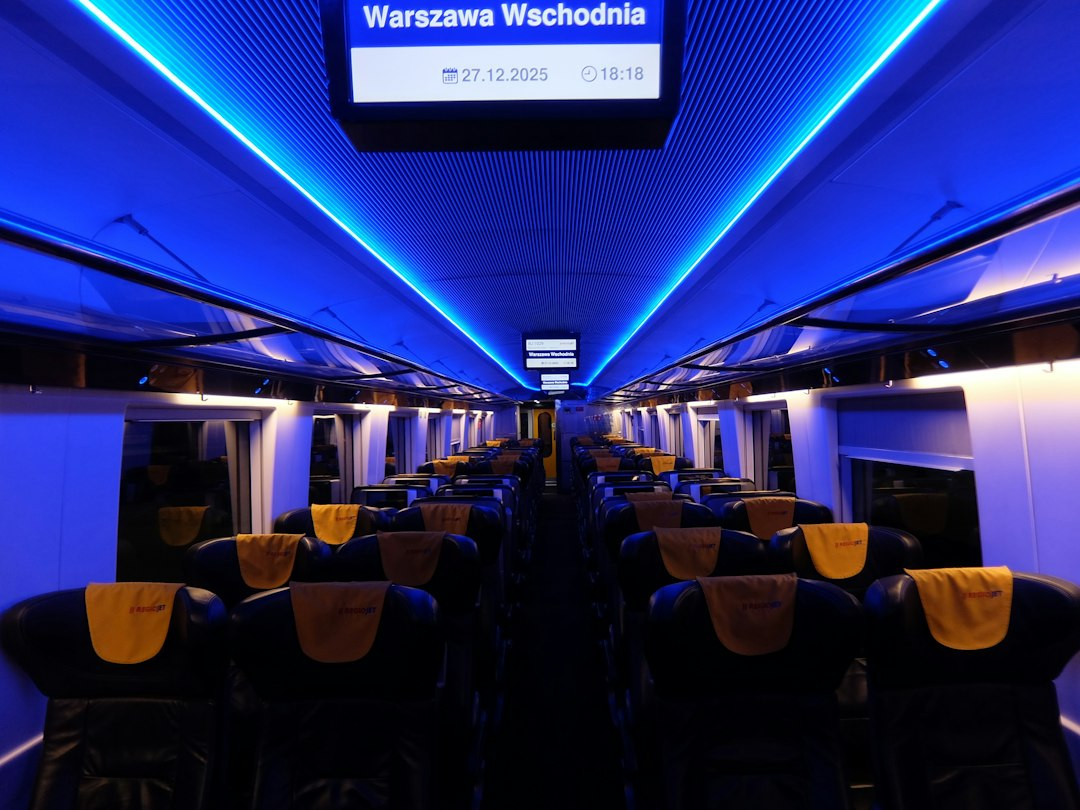 Empty train carriage with blue ambient lighting