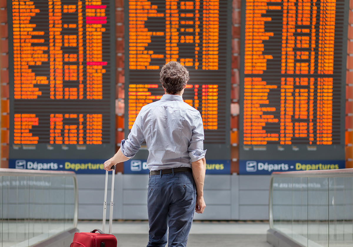 travel with international flight, person passenger waiting in airport departure terminal 