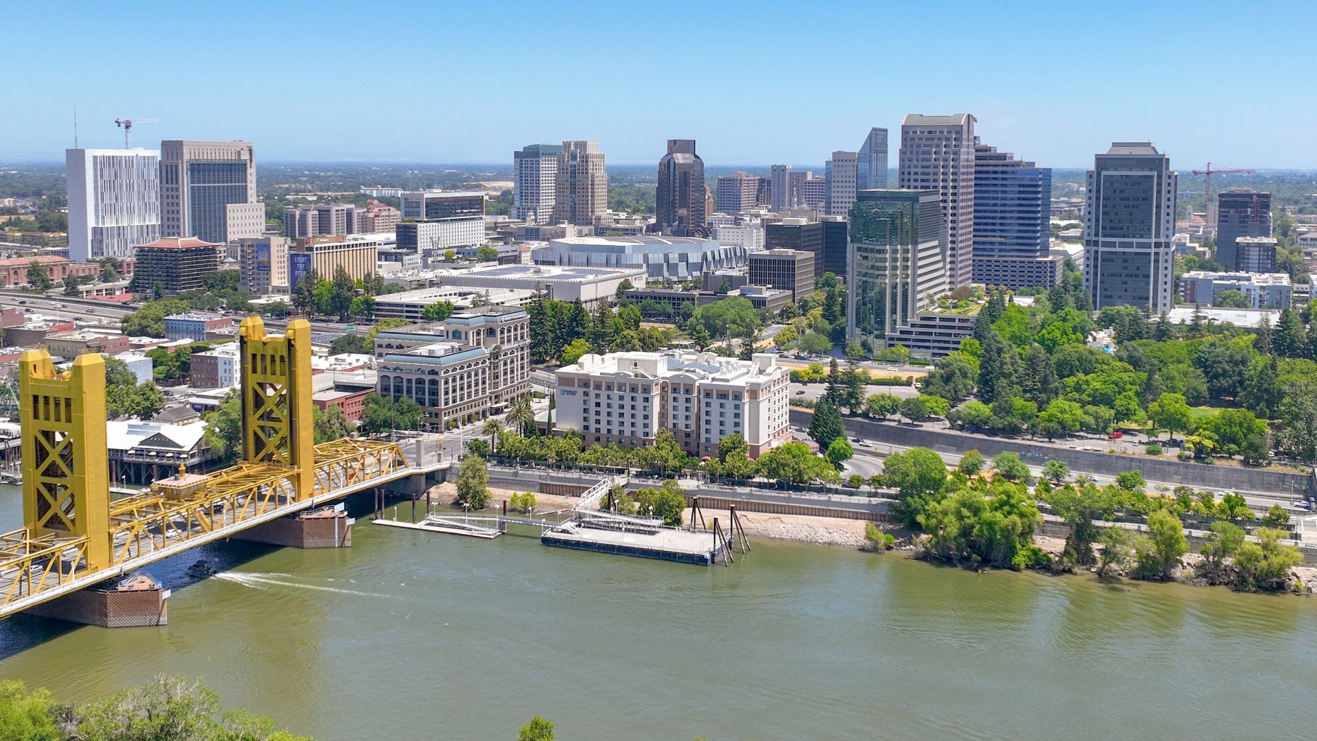 Sacramento, California skyline in 2023. The Sacramento Tani Cantil-Sakauye courthouse is seen under construction on the far left. To the right, the 17-story Resources Building is undergoing a renovation.