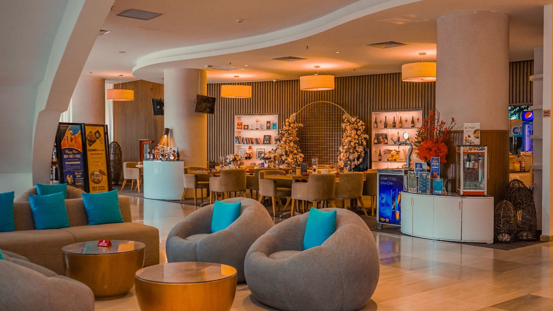 Elegant hotel lobby with contemporary seating and stylish decor creating a cozy atmosphere.
