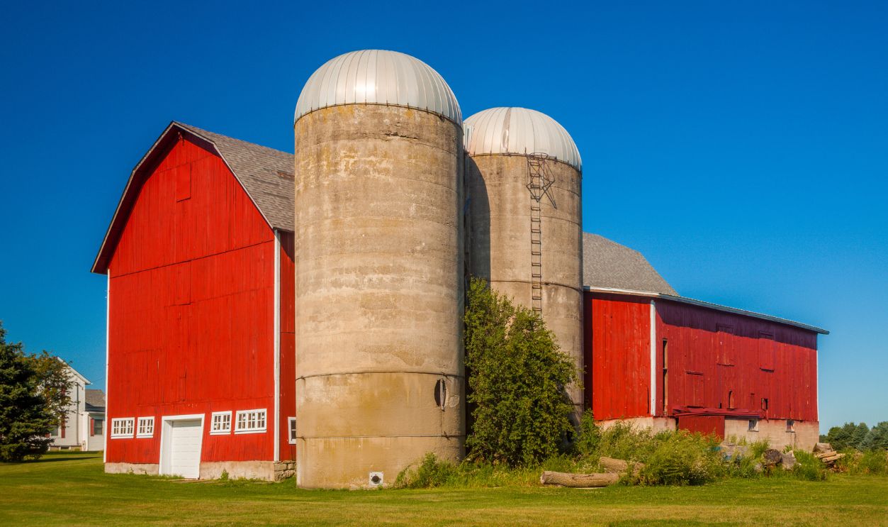 Red barn and twin silos in rural America