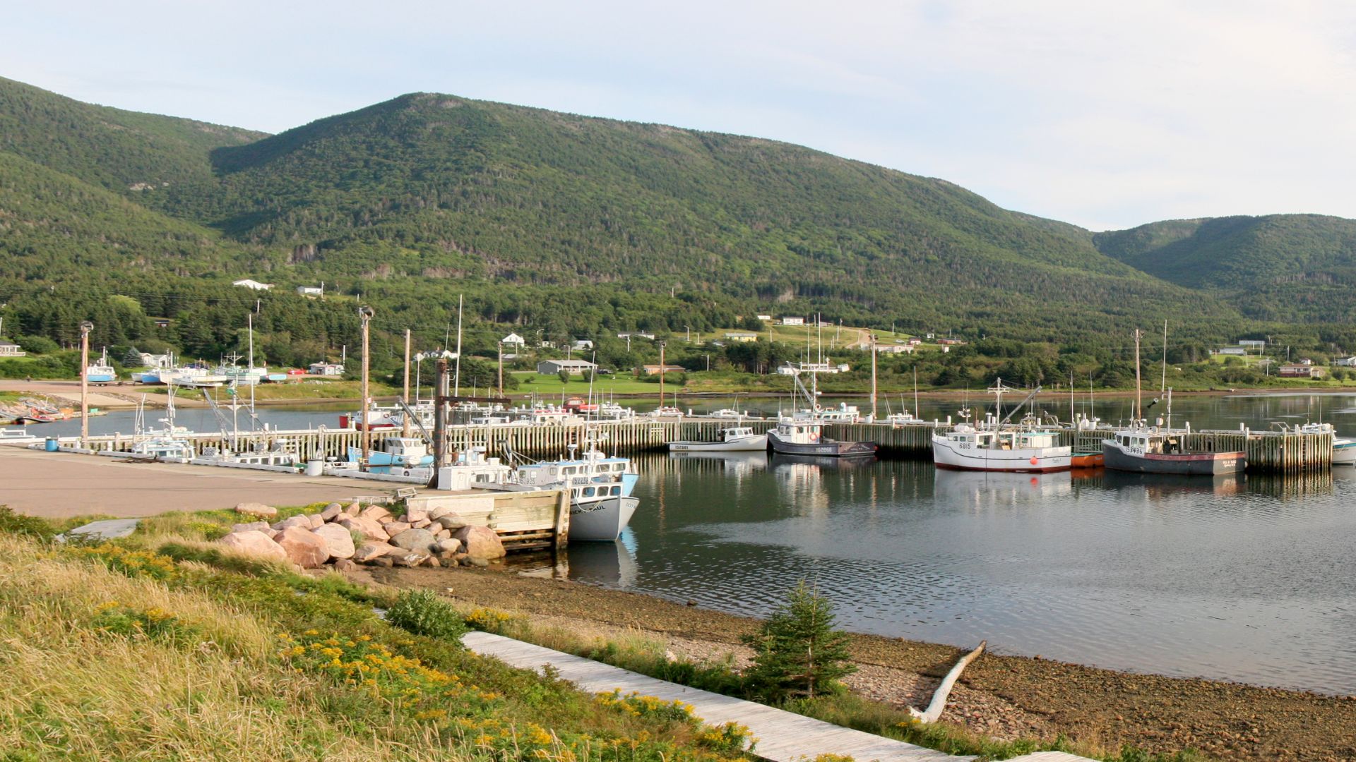 The community of Bay St Lawrence and the harbour, Nova Scotia, Canada, looking south toward the Cape Breton Highlands.